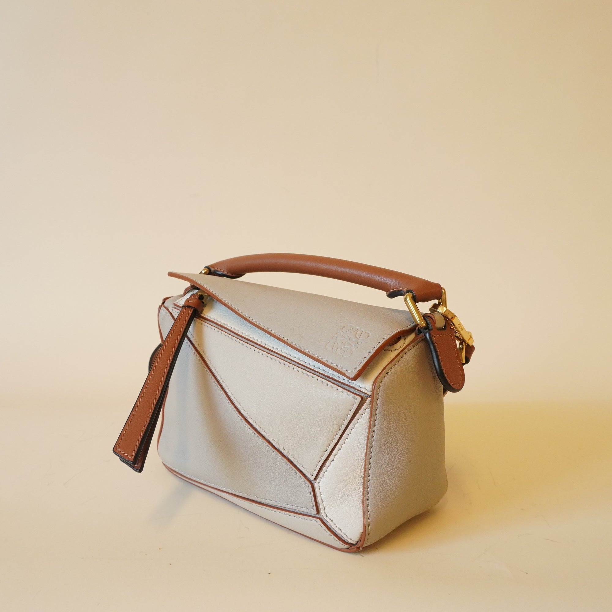 PRE-OWNED Neutral Leather Mini Puzzle Edge Shoulder Bag
