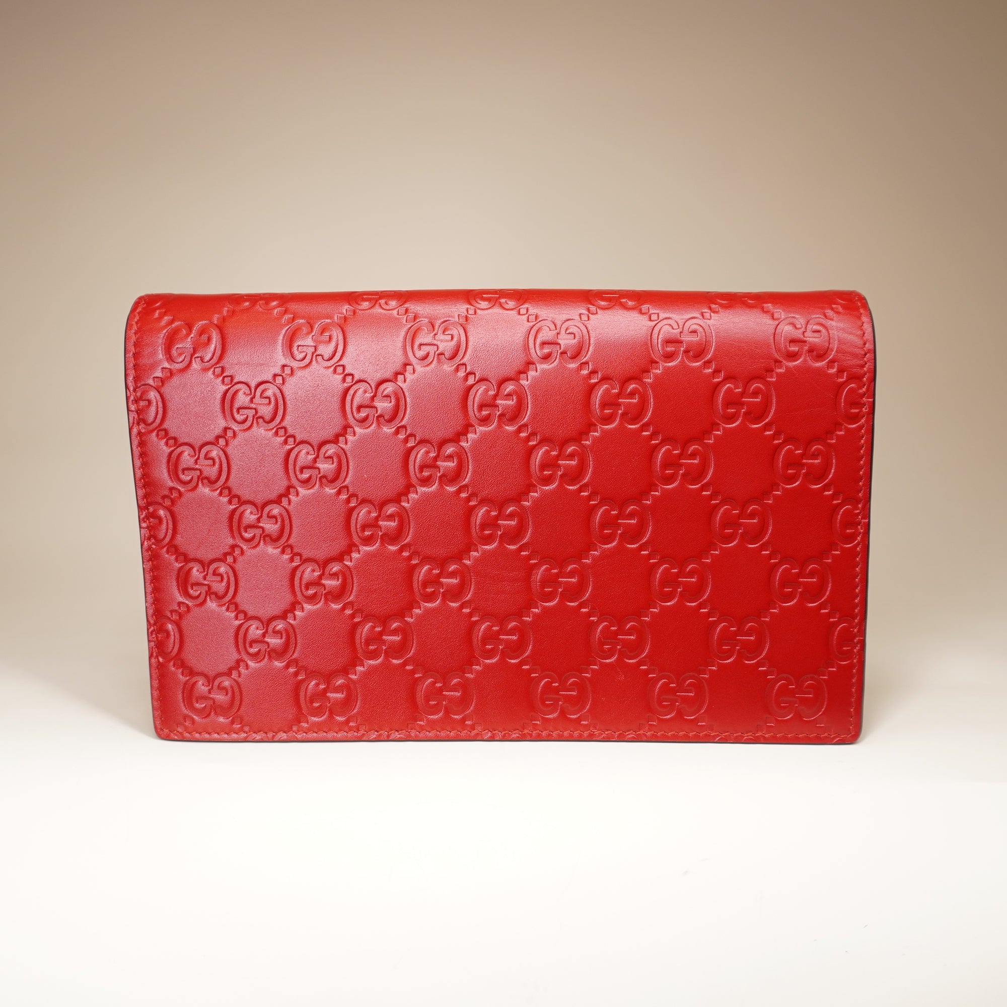 PRE-OWNED Hibiscus Red Guccissima Leather Signature WOC