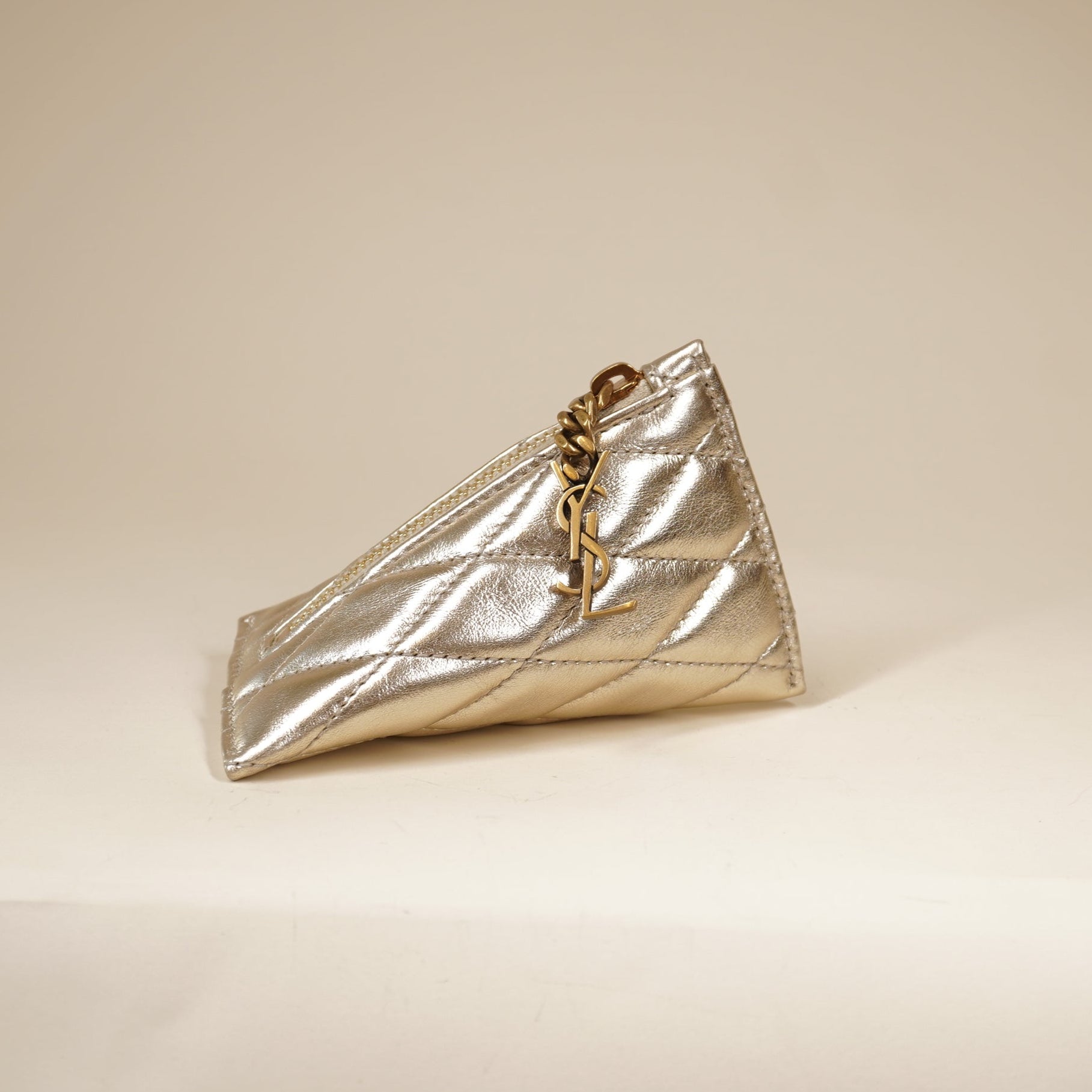 PRE-OWNED Metallic Calfskin Berlingo Bag Charm Champagne Gold