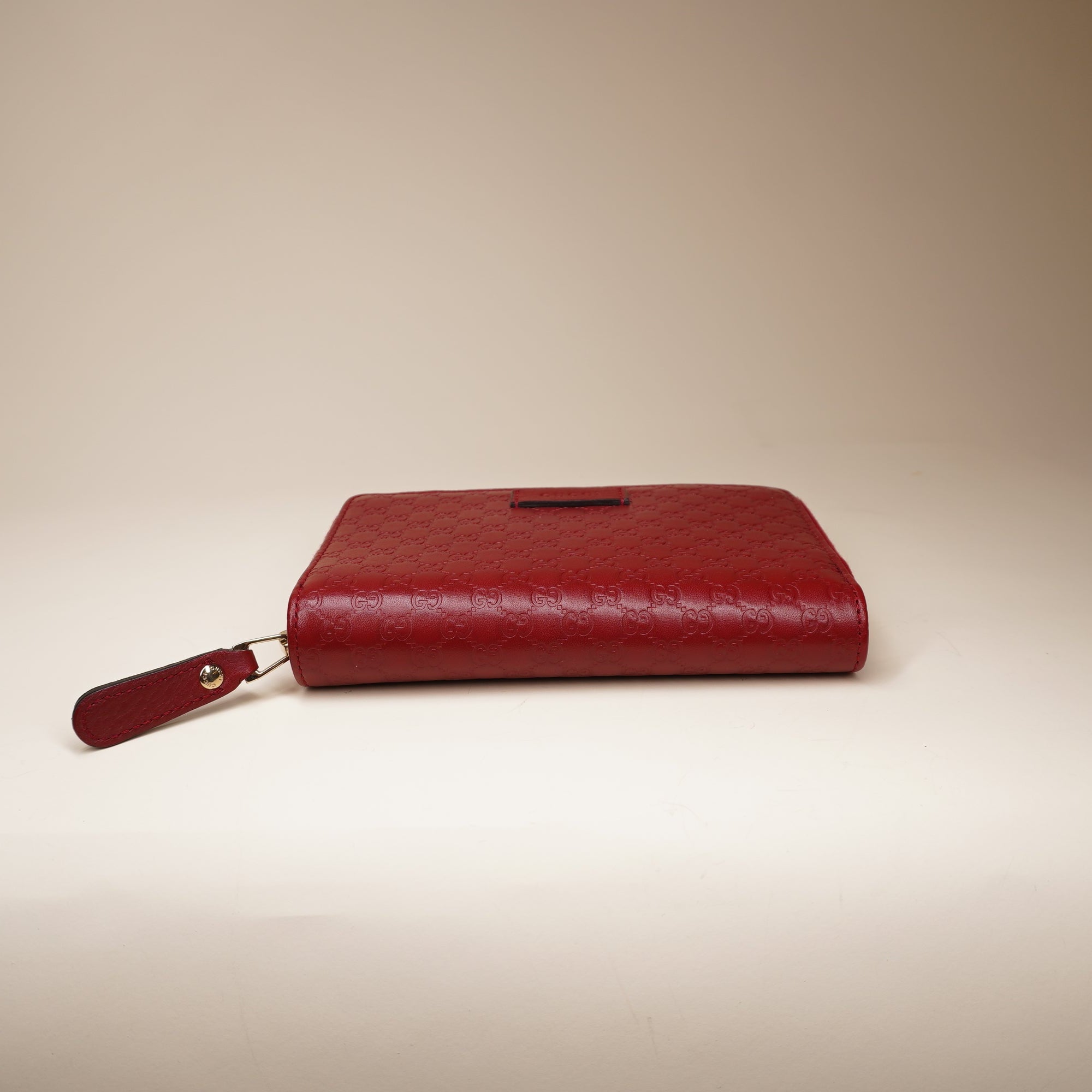 PRE-OWNED Microguccissima Zip Around Wallet Red