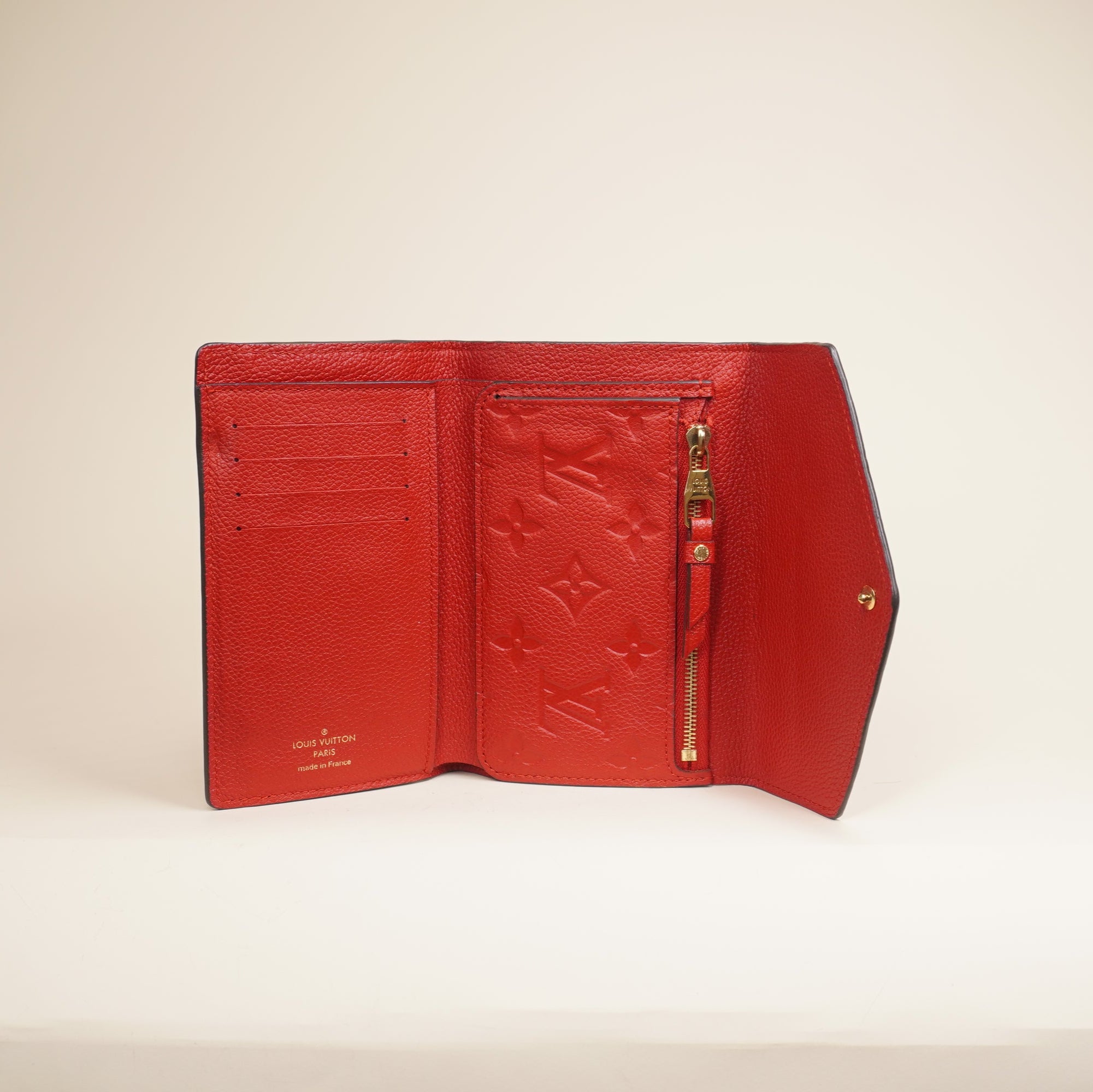 PRE-OWNED LV Cherry Empreinte Compact Curieuse Wallet