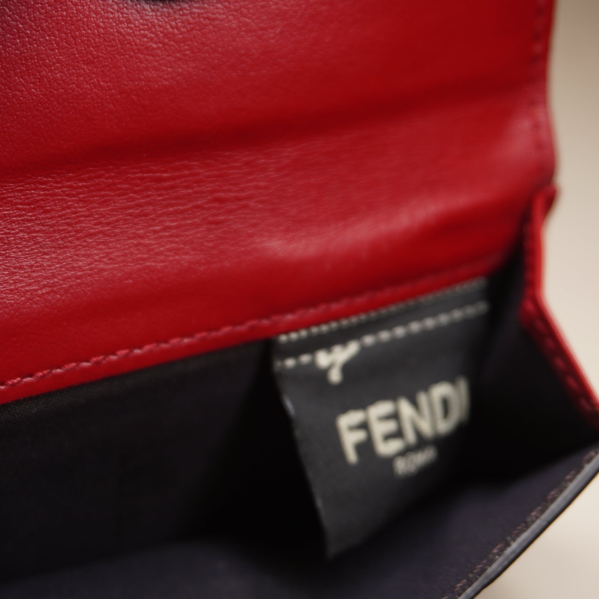 PRE-OWNED Vitello Cruise F is Fendi Micro Tri-Fold Monogram Red Wallet