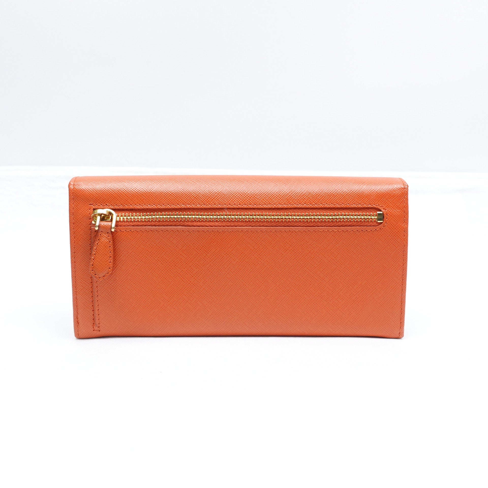 PRE-OWNED Orange Saffiano Lux Leather Bow Flap Continental Wallet