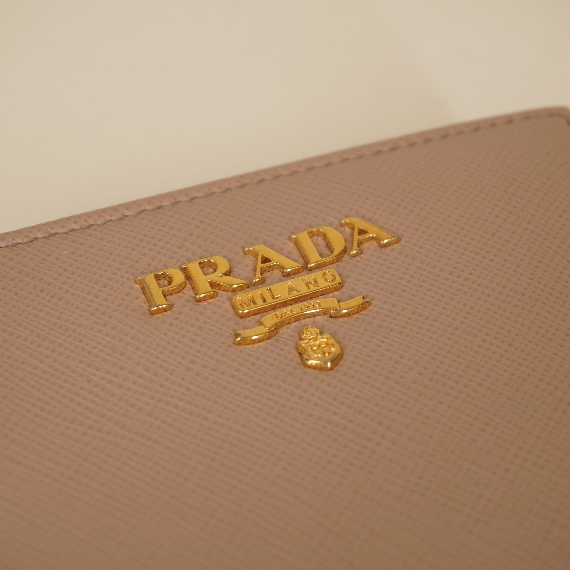 PRE-OWNED Beige Saffiano Metal Leather Frame Compact Wallet