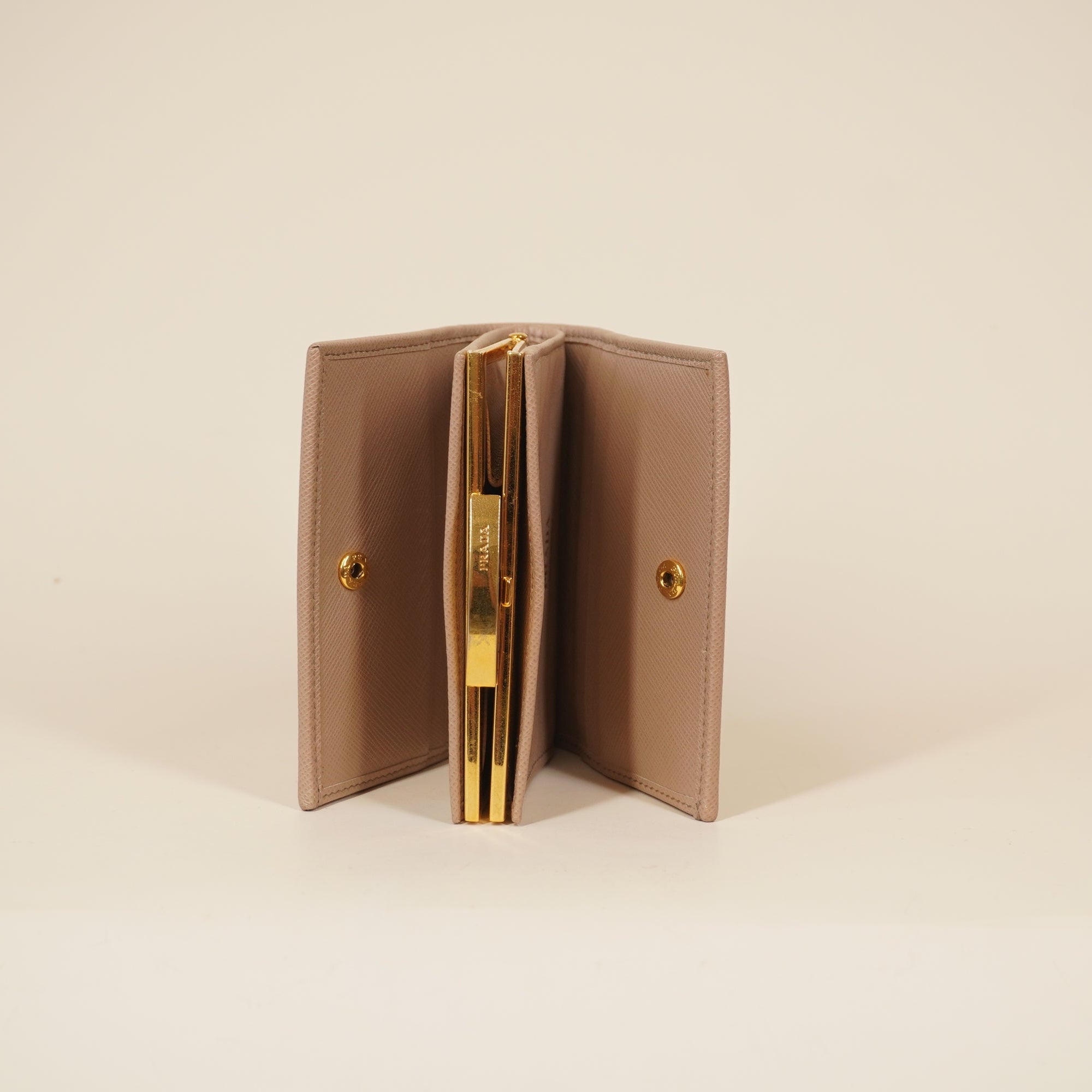 PRE-OWNED Beige Saffiano Metal Leather Frame Compact Wallet