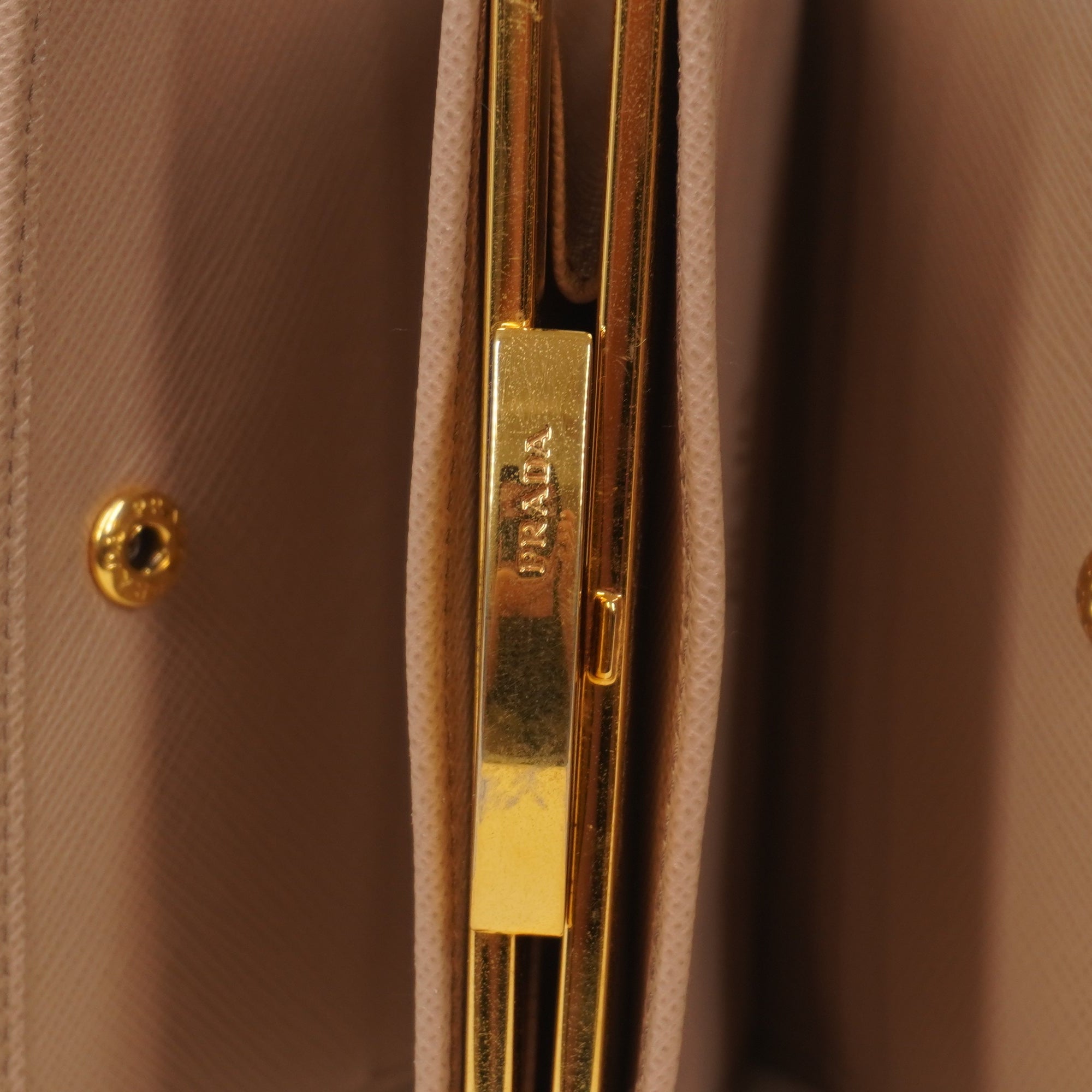 PRE-OWNED Beige Saffiano Metal Leather Frame Compact Wallet