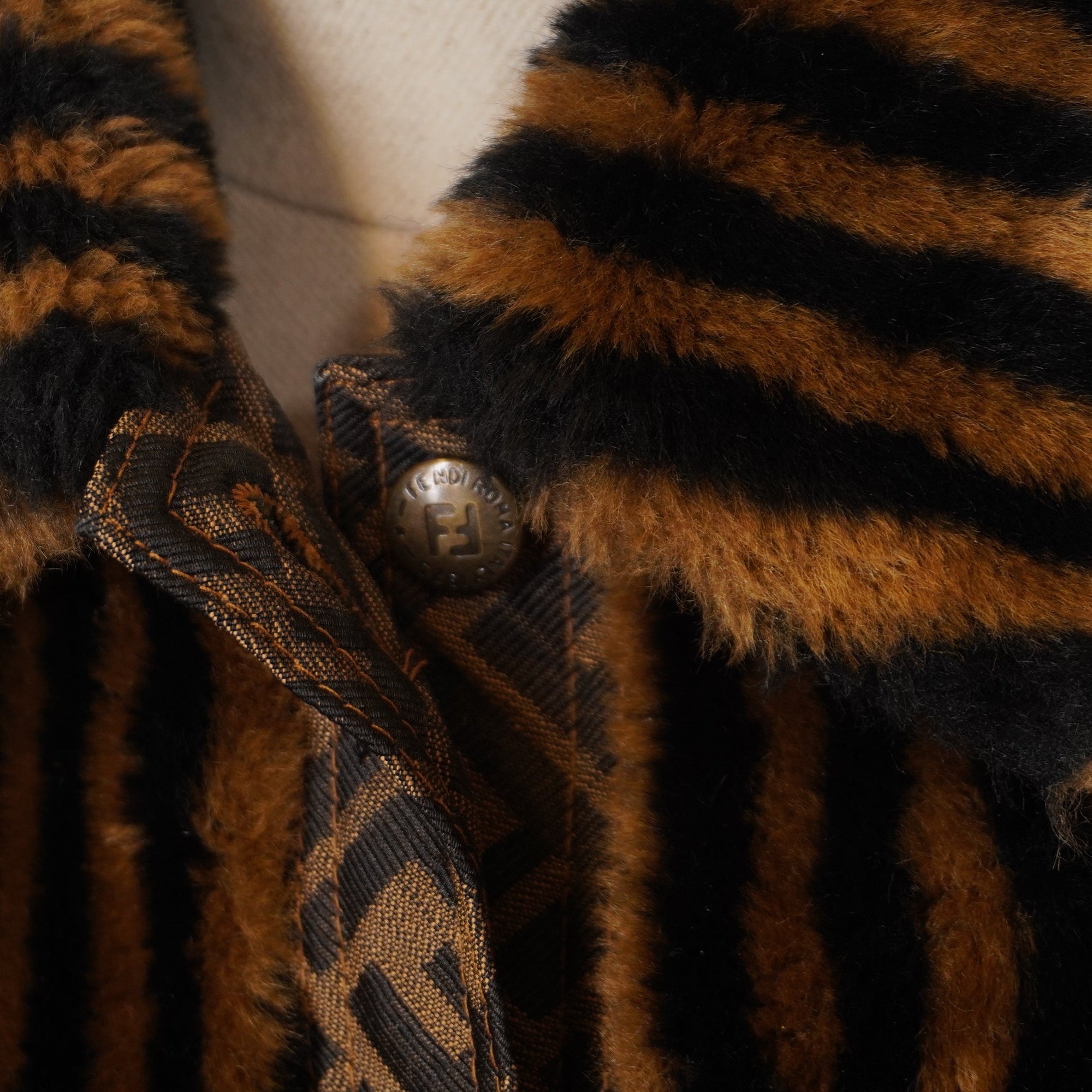 PRE-OWNED FF Brown Striped Logo Fur Coat