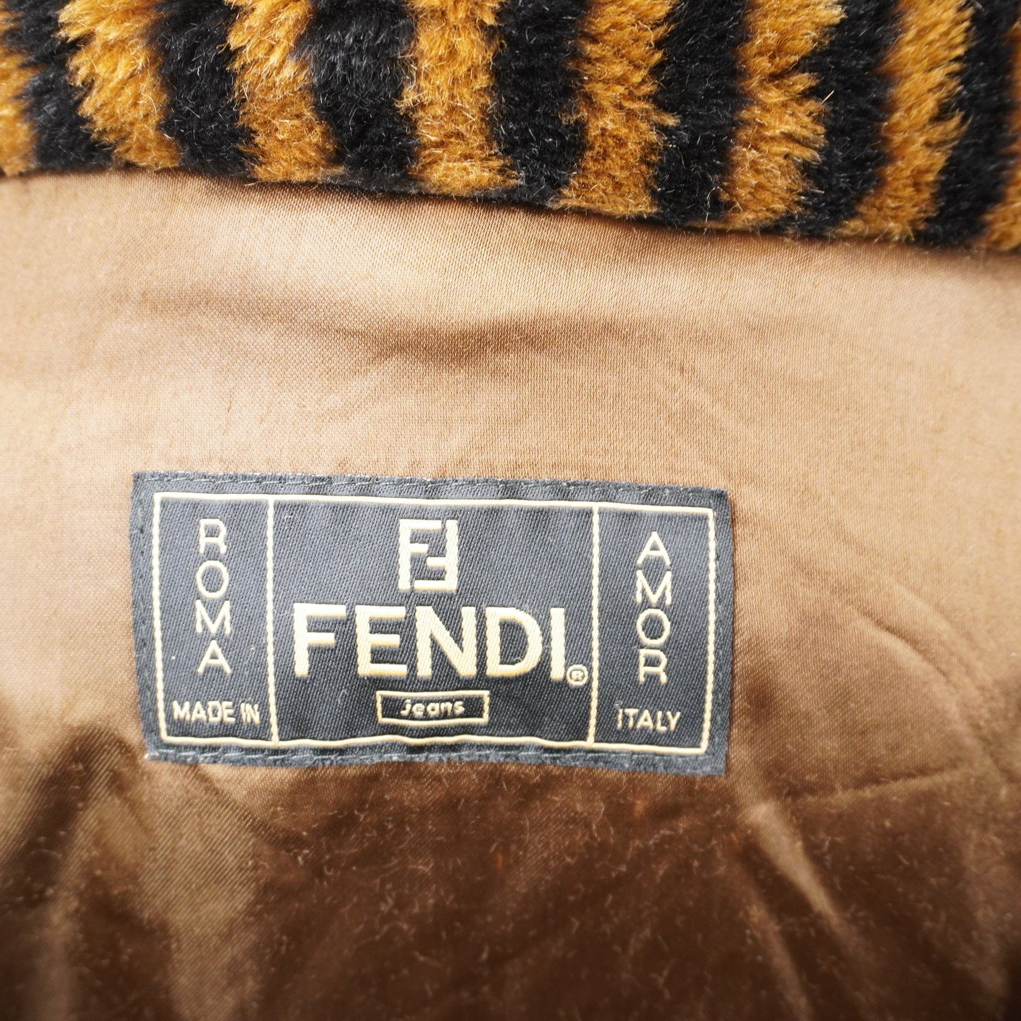 PRE-OWNED FF Brown Striped Logo Fur Coat