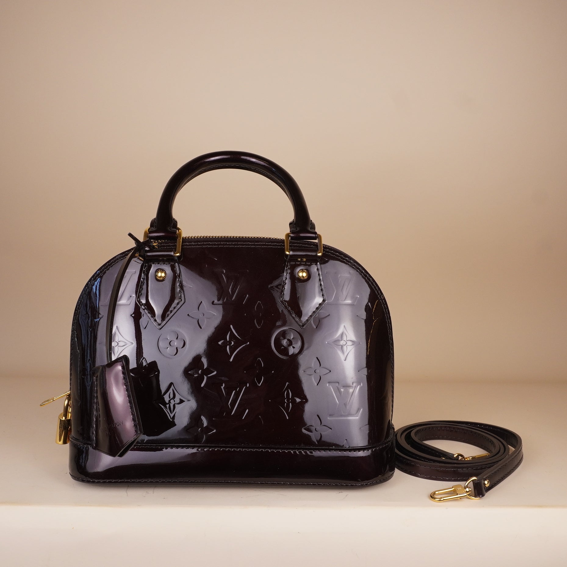 PRE-OWNED LV Vernis Alma BB Amarante