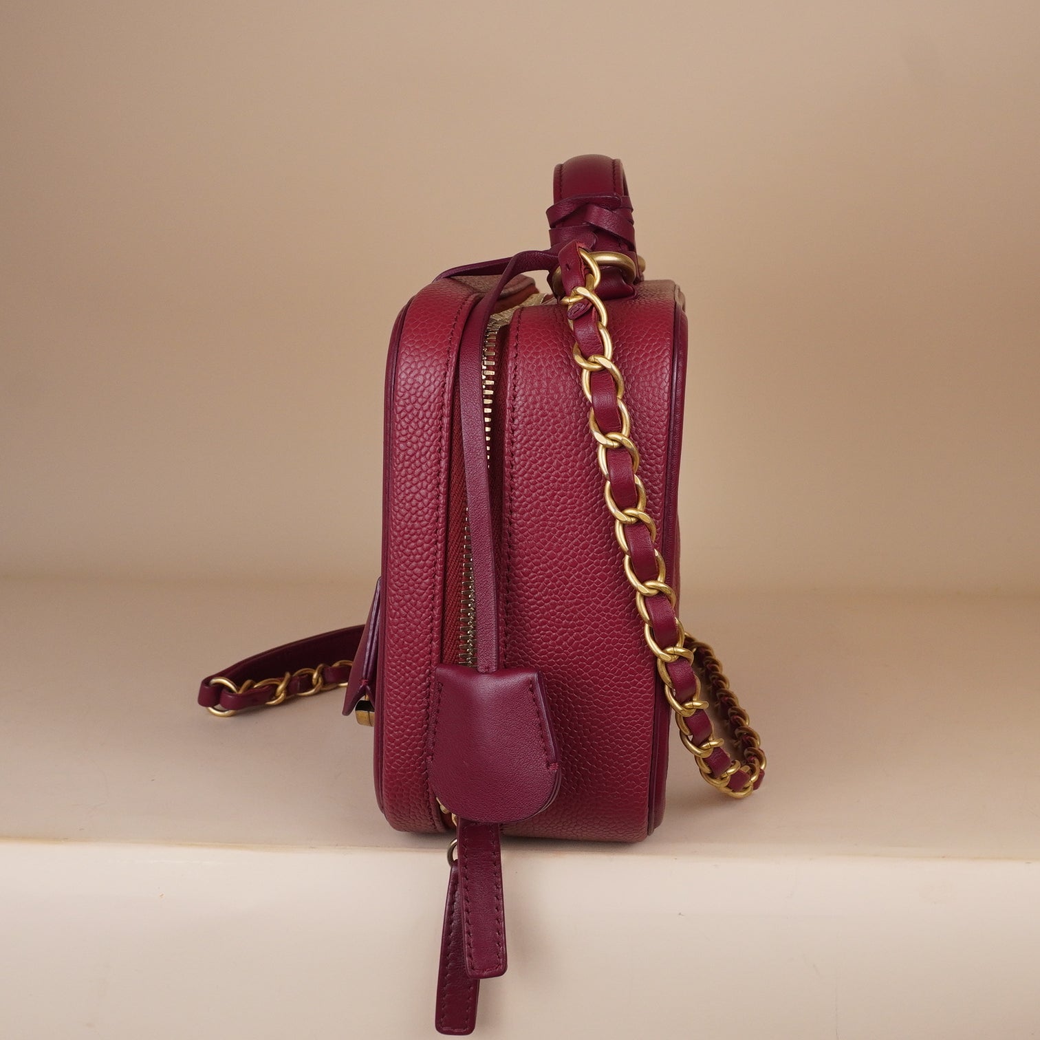 PRE-OWNED CC Burgundy Caviar Quilted Medium CC Filigree Vanity Case Shoulder Bag