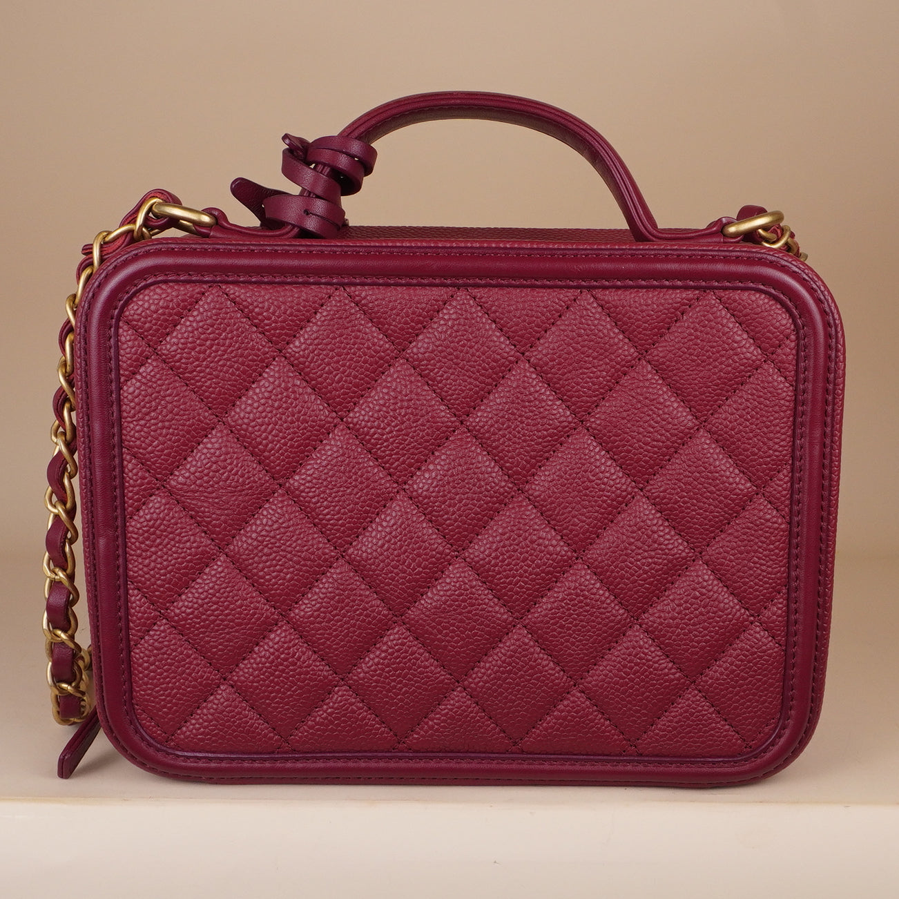 PRE-OWNED CC Burgundy Caviar Quilted Medium CC Filigree Vanity Case Shoulder Bag