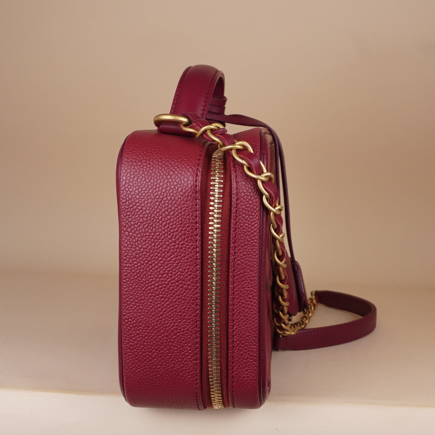 PRE-OWNED CC Burgundy Caviar Quilted Medium CC Filigree Vanity Case Shoulder Bag