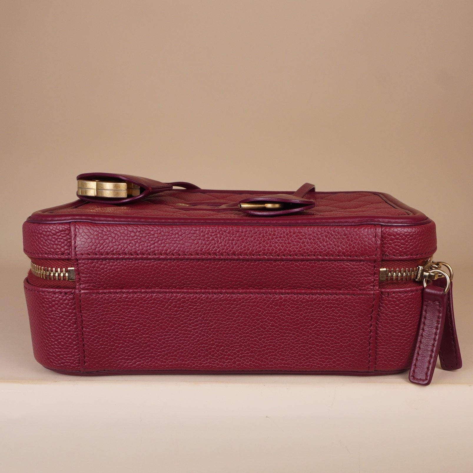 PRE-OWNED CC Burgundy Caviar Quilted Medium CC Filigree Vanity Case Shoulder Bag
