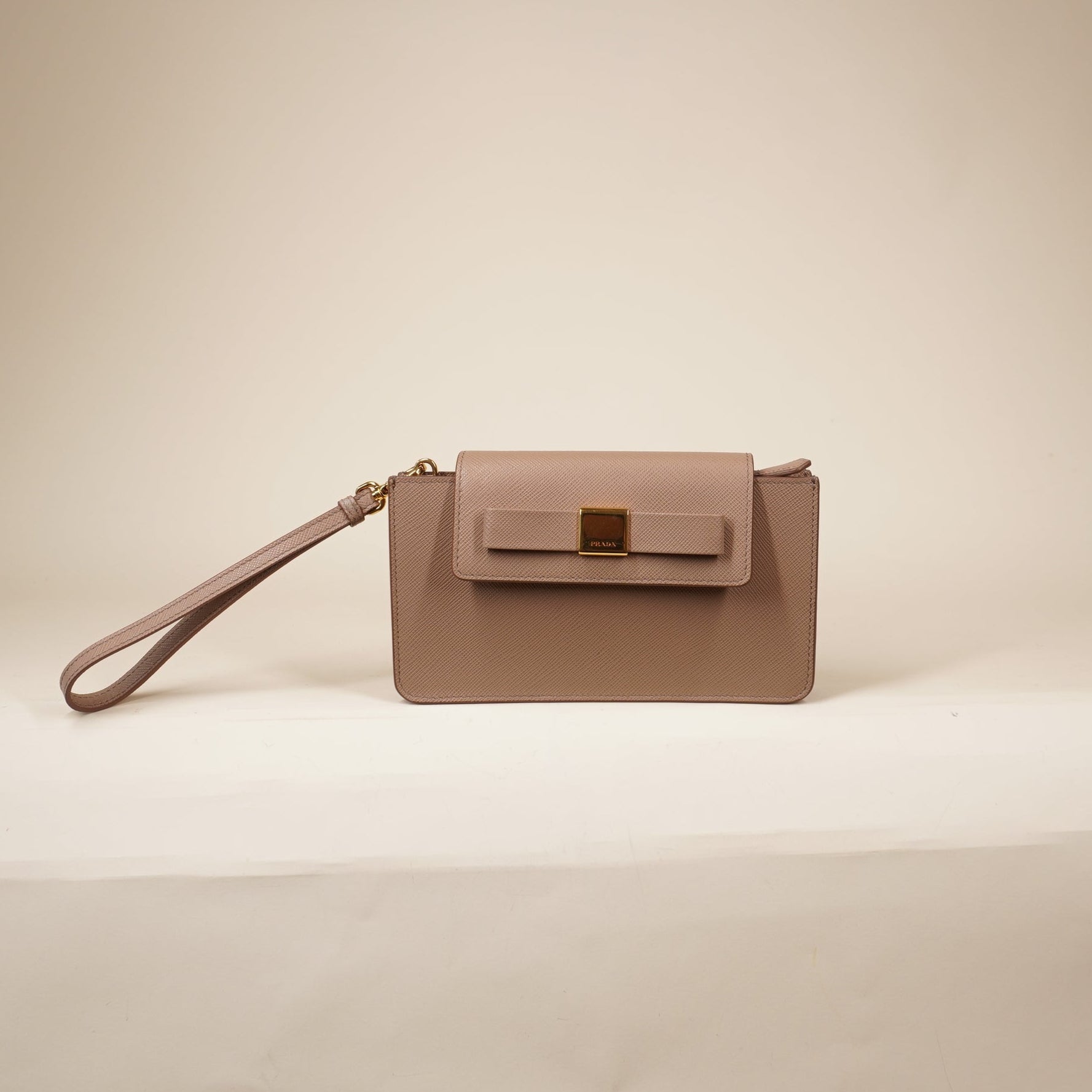 PRE-OWNED  Beige Saffiano Bow Wristlet Clutch 