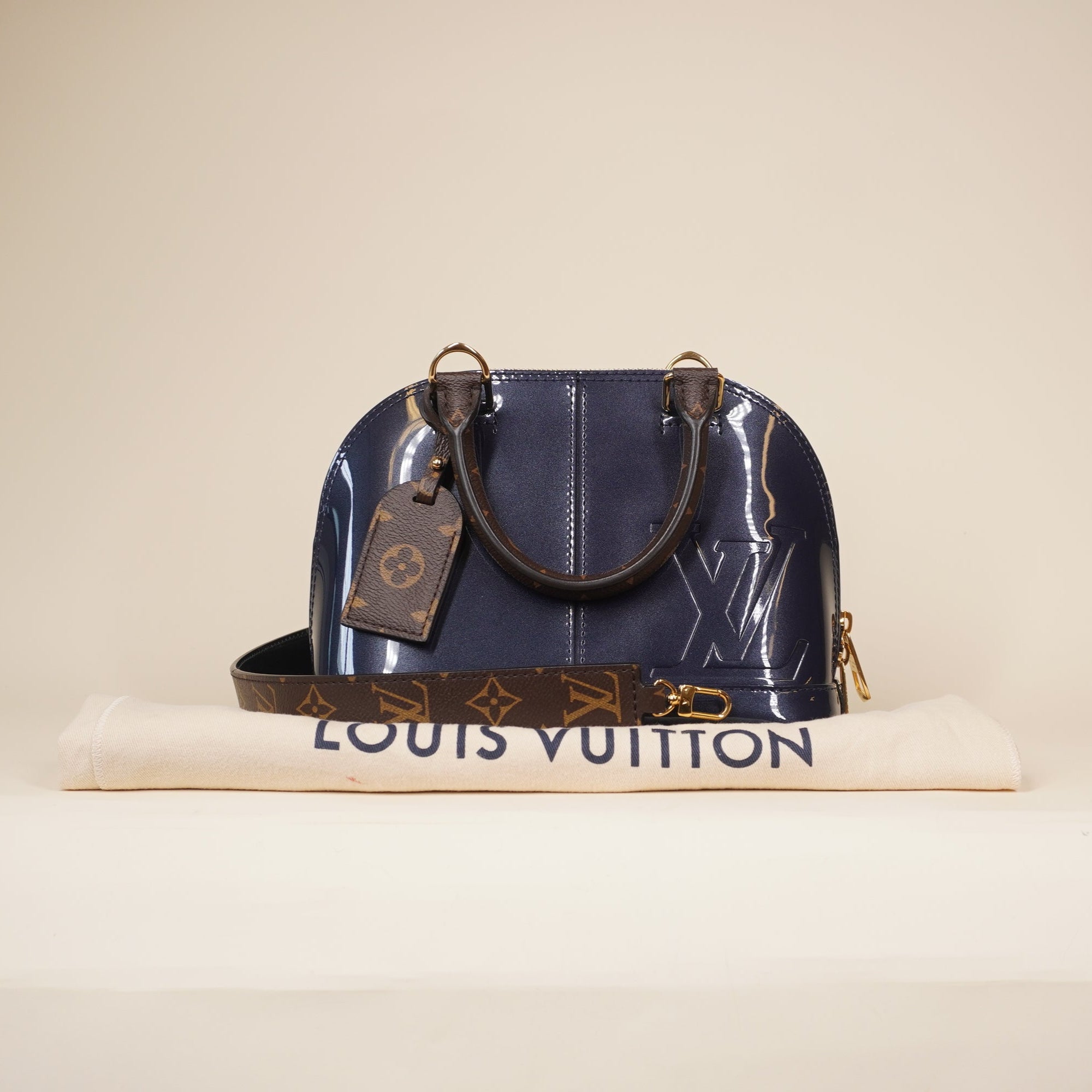 PRE-OWNED Navy Vernis Lisse and Monogram Alma BB Shoulder Bag