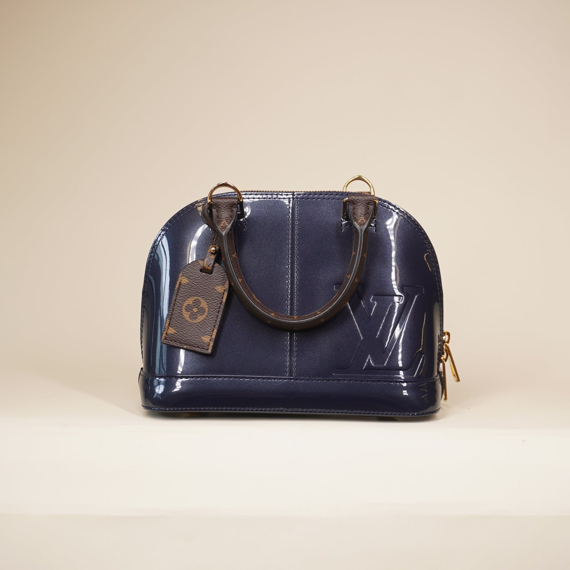 PRE-OWNED Navy Vernis Lisse and Monogram Alma BB Shoulder Bag