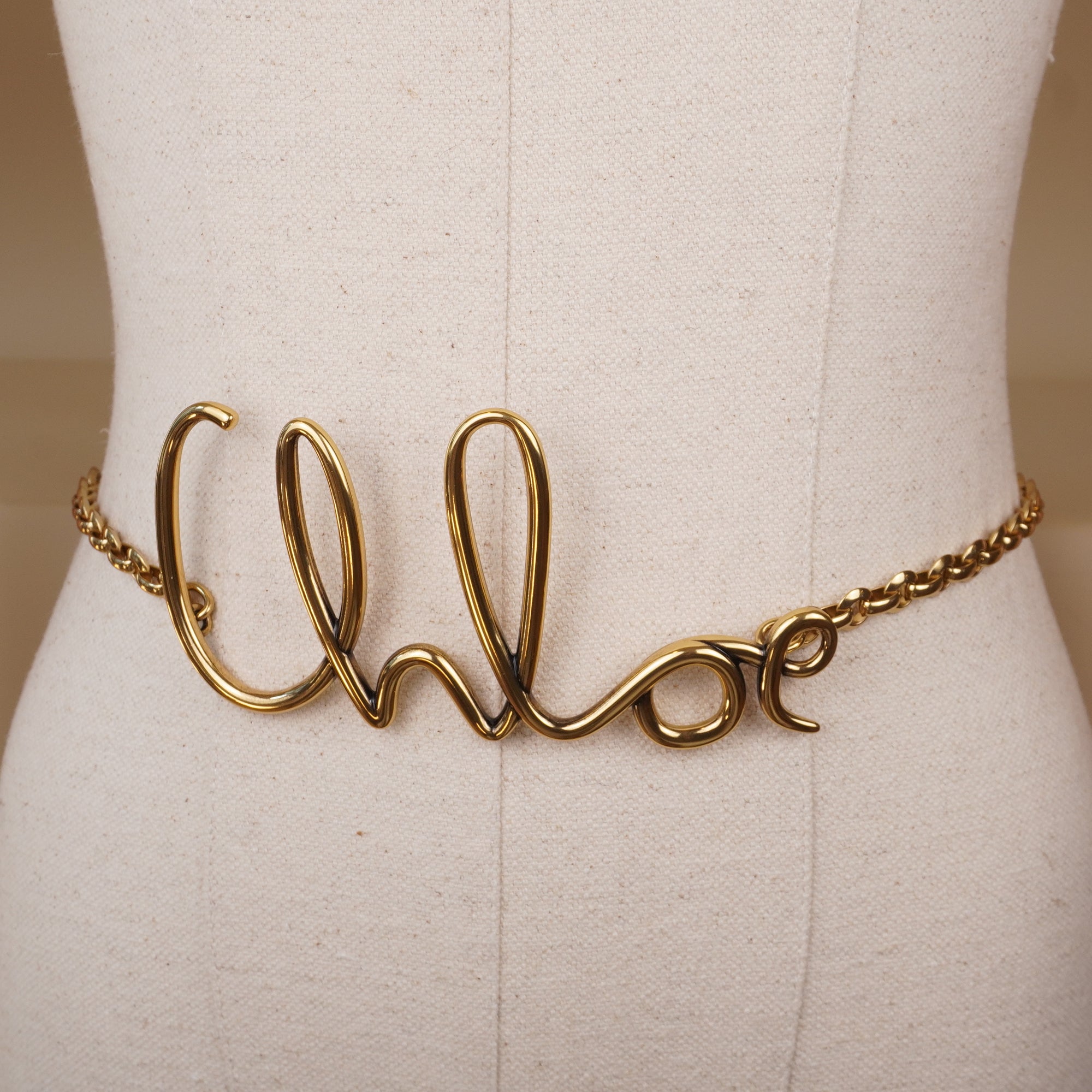 PRE-OWNED Gold Metal Iconic Small Belt