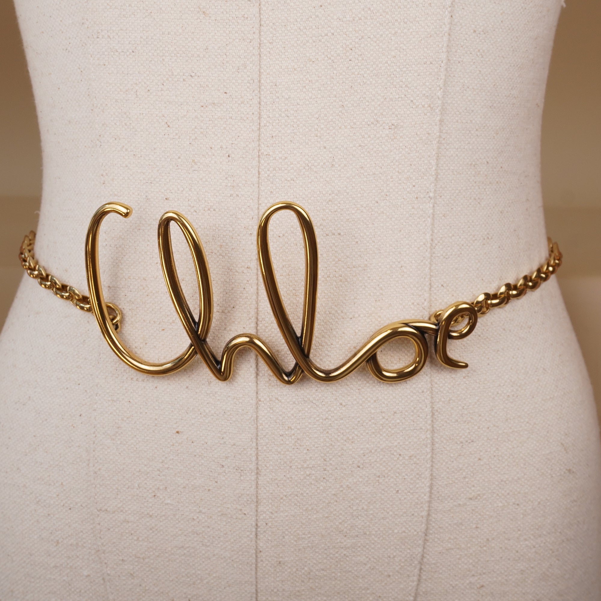 PRE-OWNED Gold Metal Iconic Small Belt