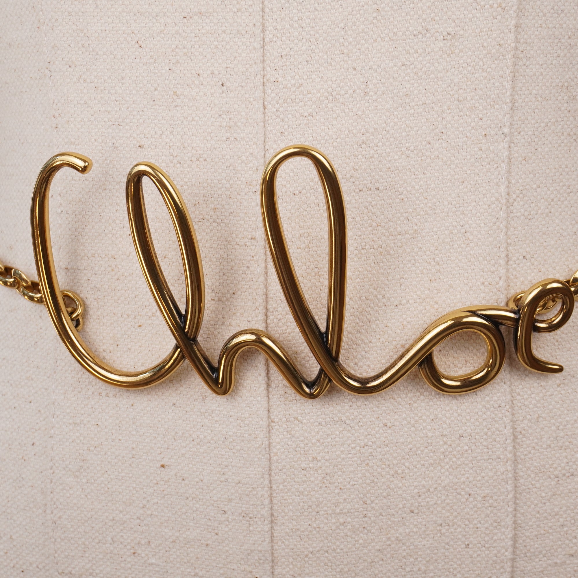PRE-OWNED Gold Metal Iconic Small Belt