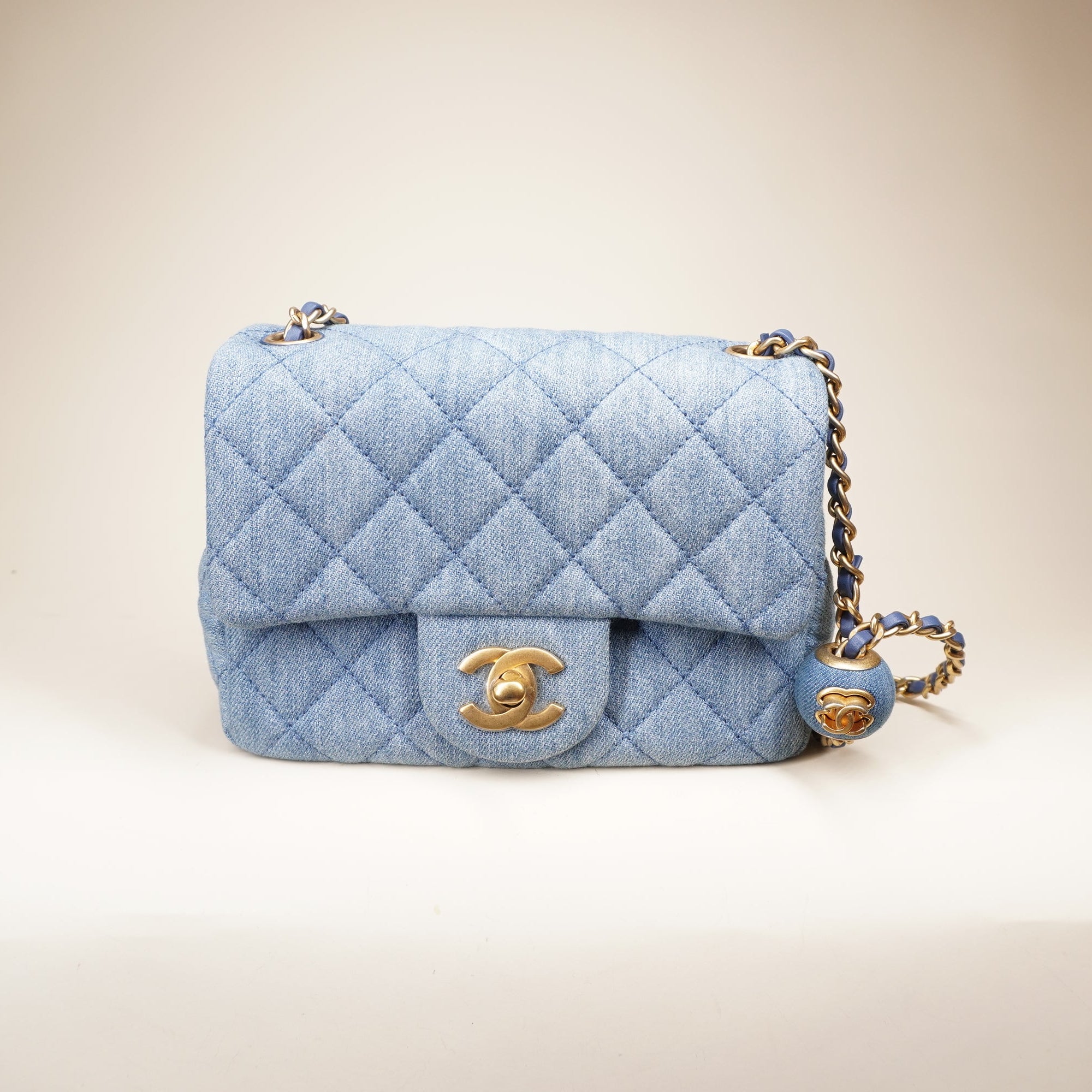 PRE-OWNED CC Denim Quilted Mini Crush Flap