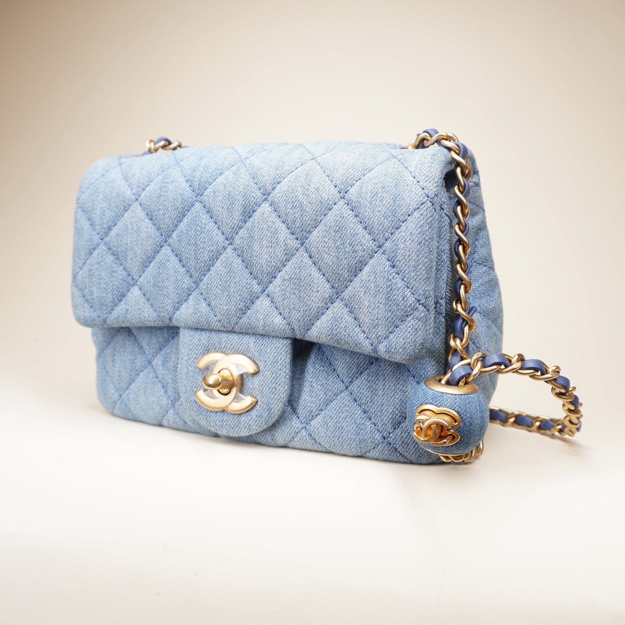 PRE-OWNED CC Denim Quilted Mini Crush Flap