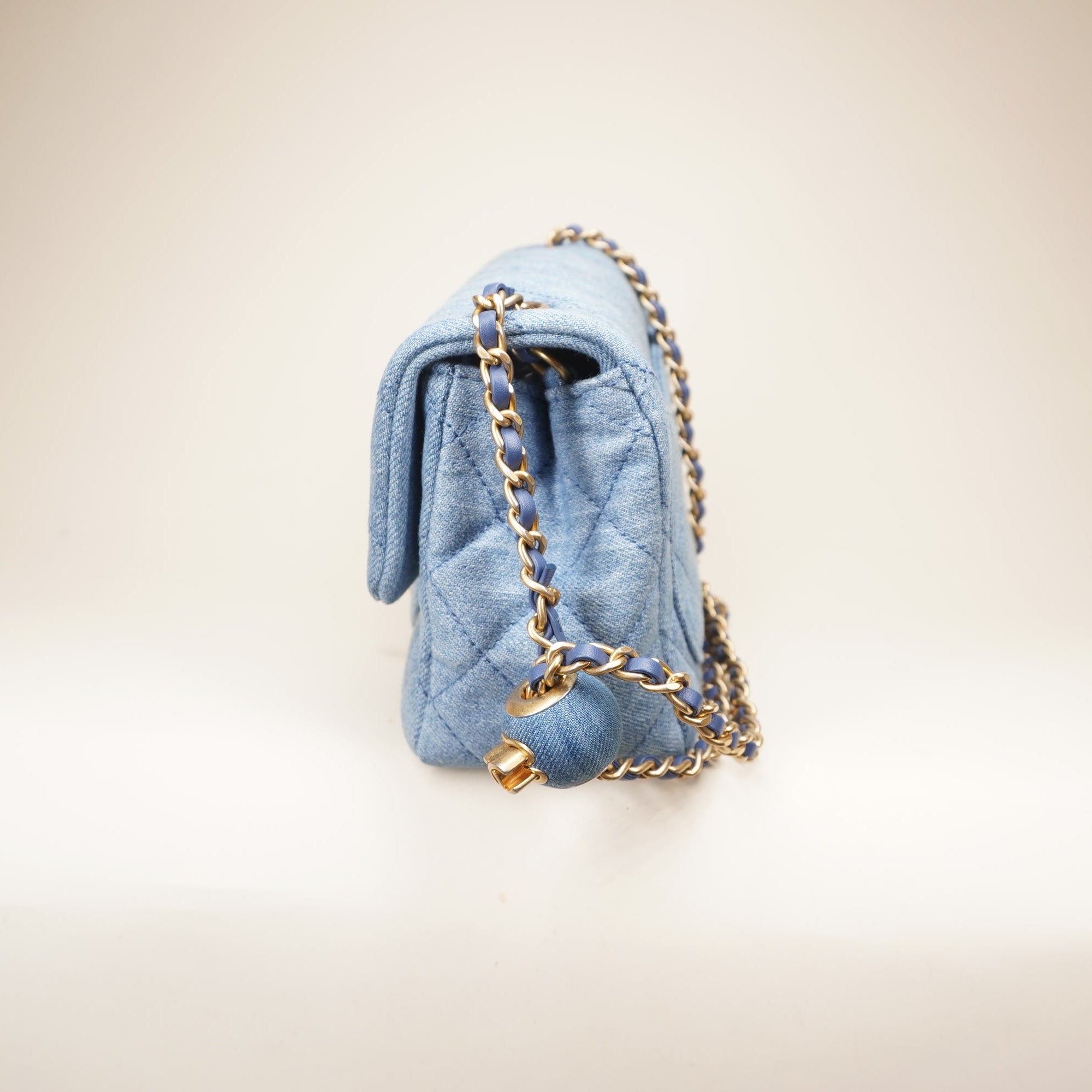 PRE-OWNED CC Denim Quilted Mini Crush Flap