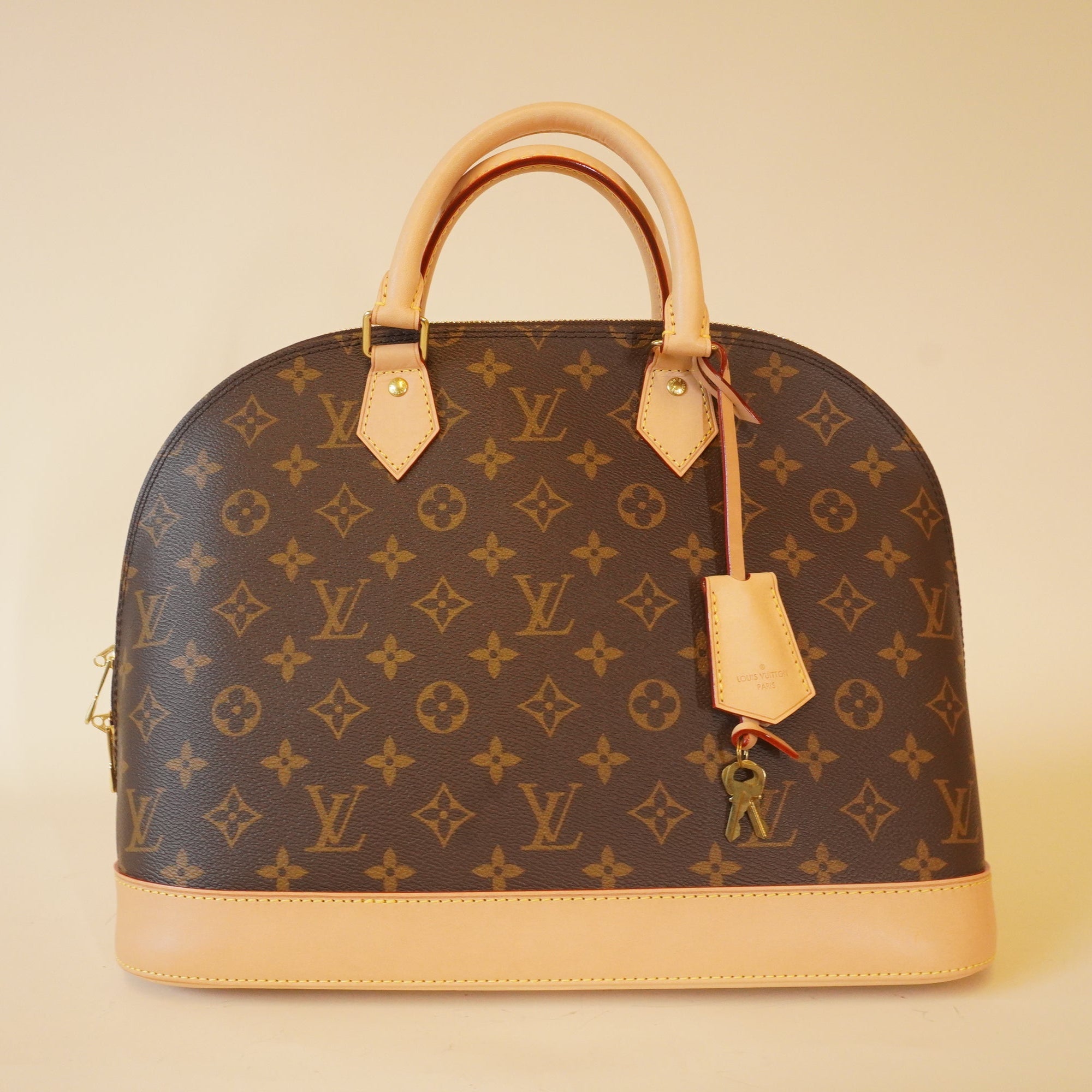 Bolso Alma MM de lona con monograma LV de segunda mano