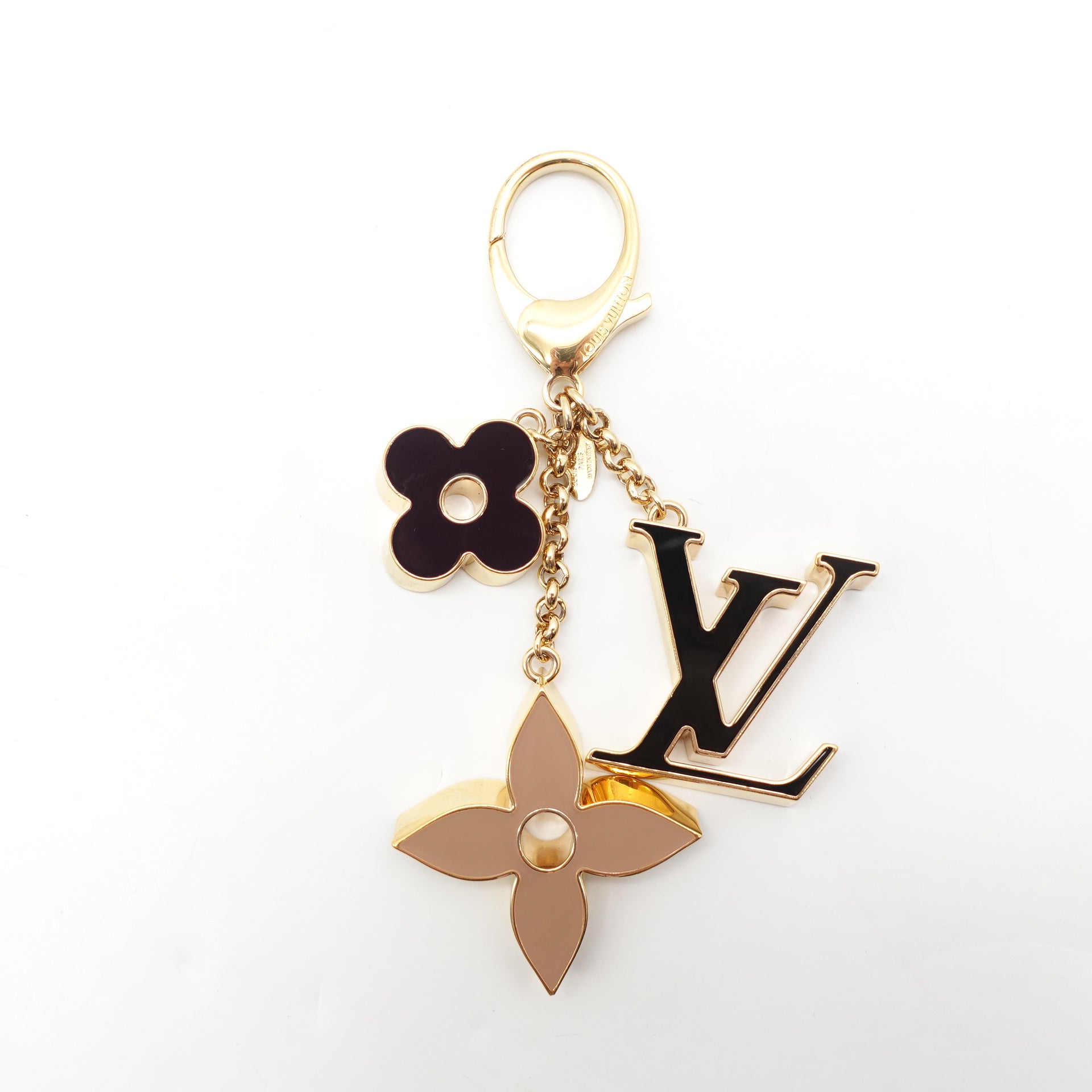 Llavero y dije para bolso con monograma Fleur de LV USADO