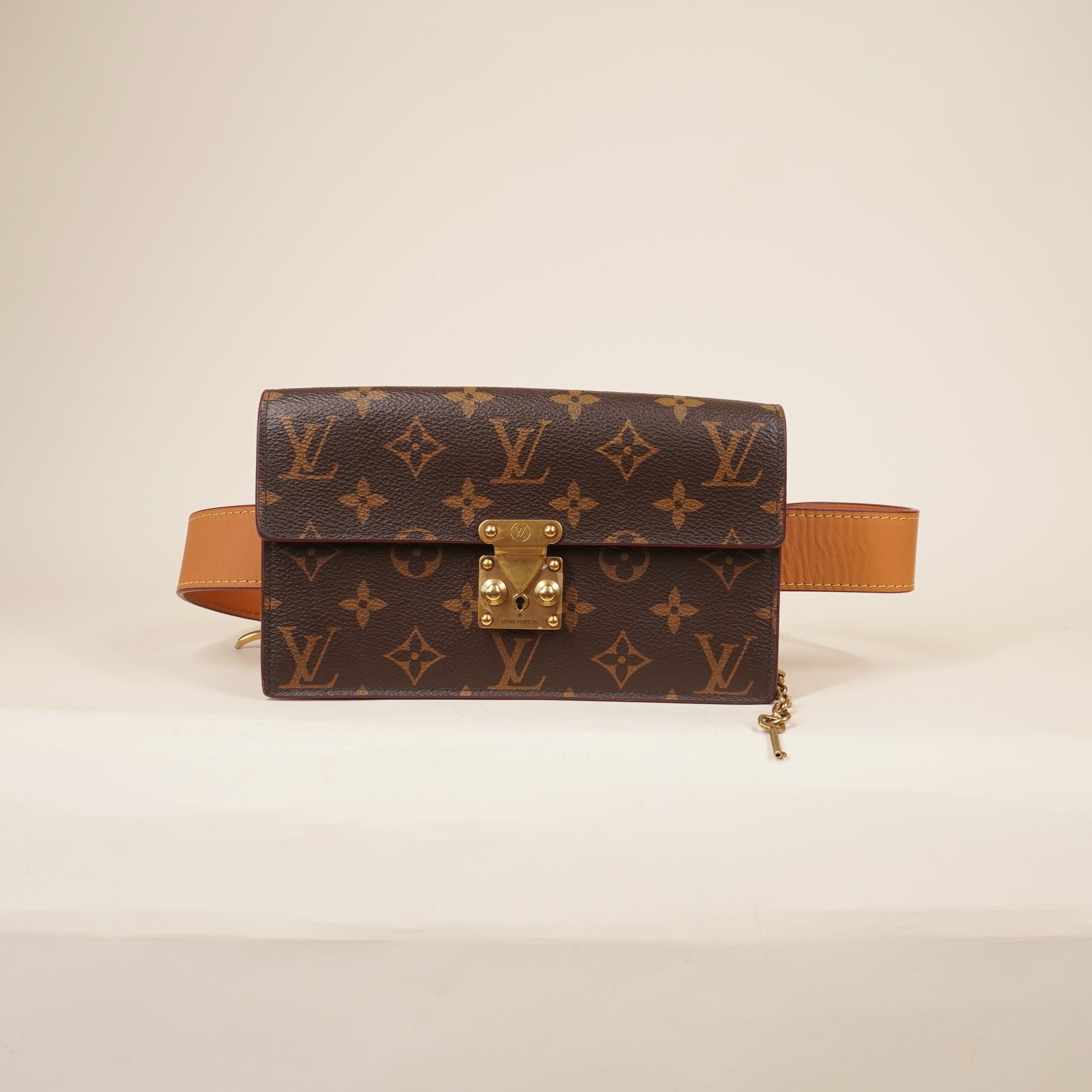 PRE-OWNED LV Monogram S Lock Belt Pouch MM