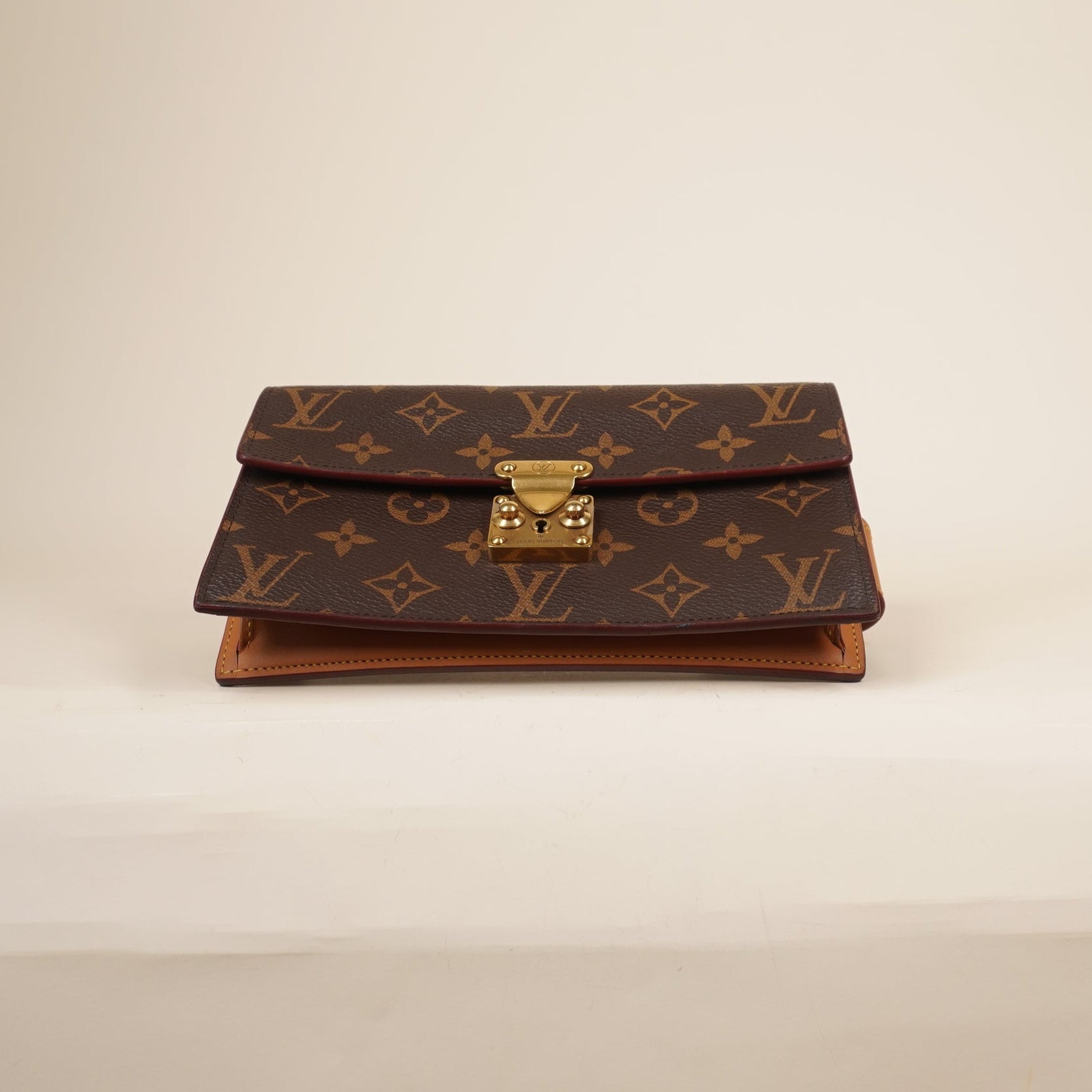 PRE-OWNED LV Monogram S Lock Belt Pouch MM