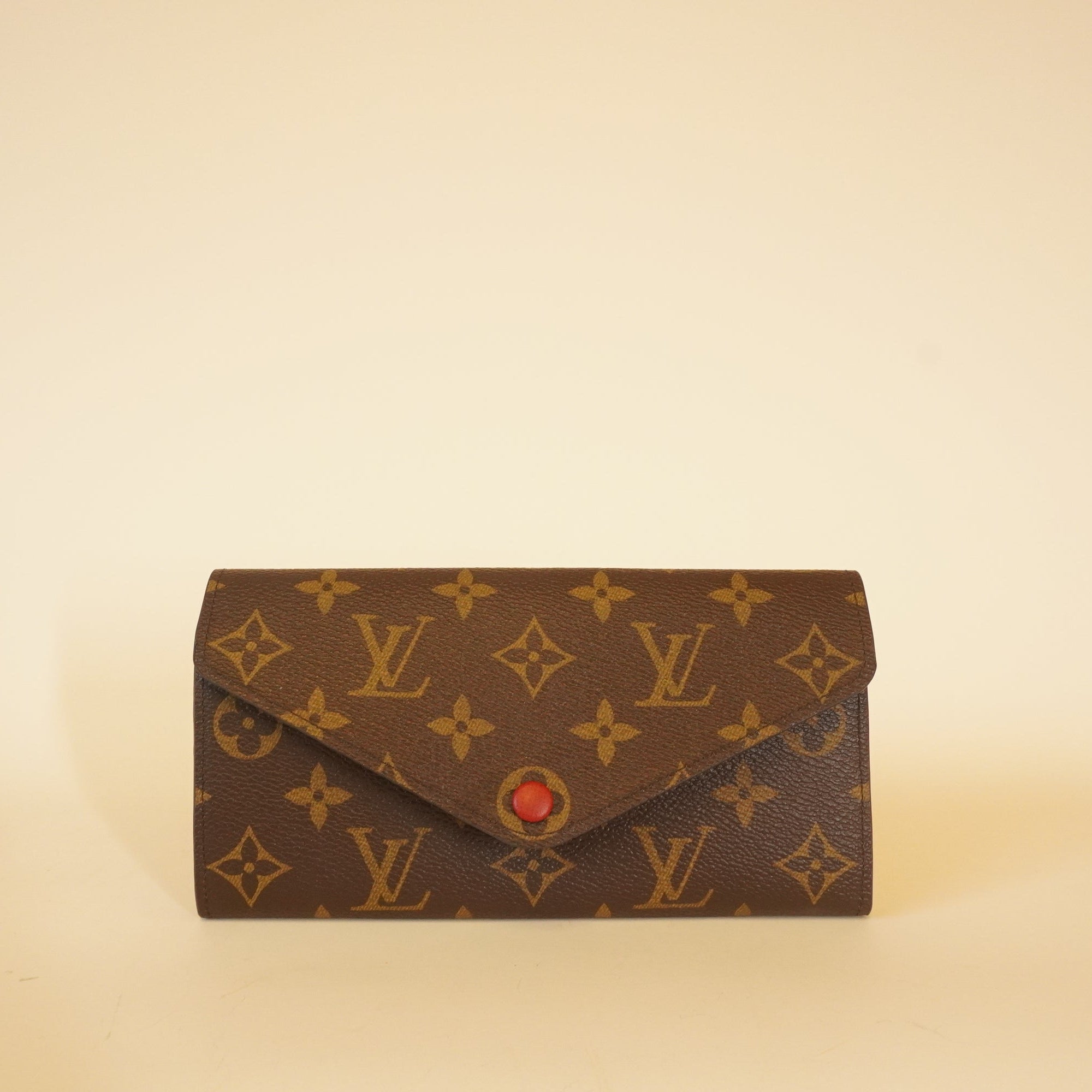 Cartera Josephine de lona roja con monograma LV de segunda mano