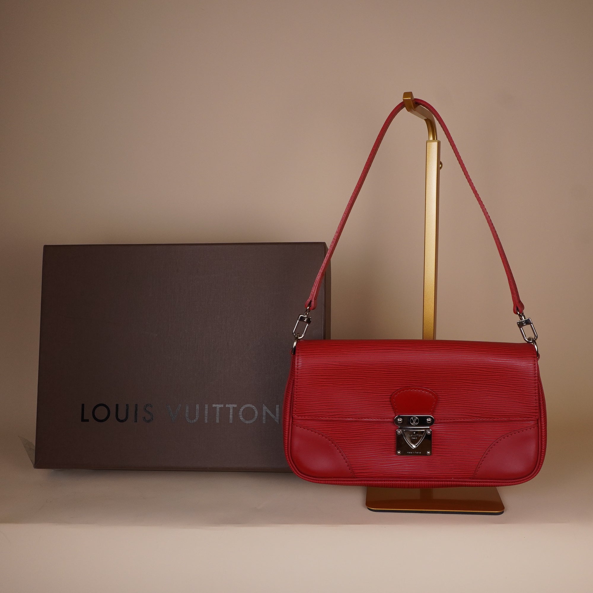 PRE-OWNED Rouge Epi Leather Pochette Segur Bag