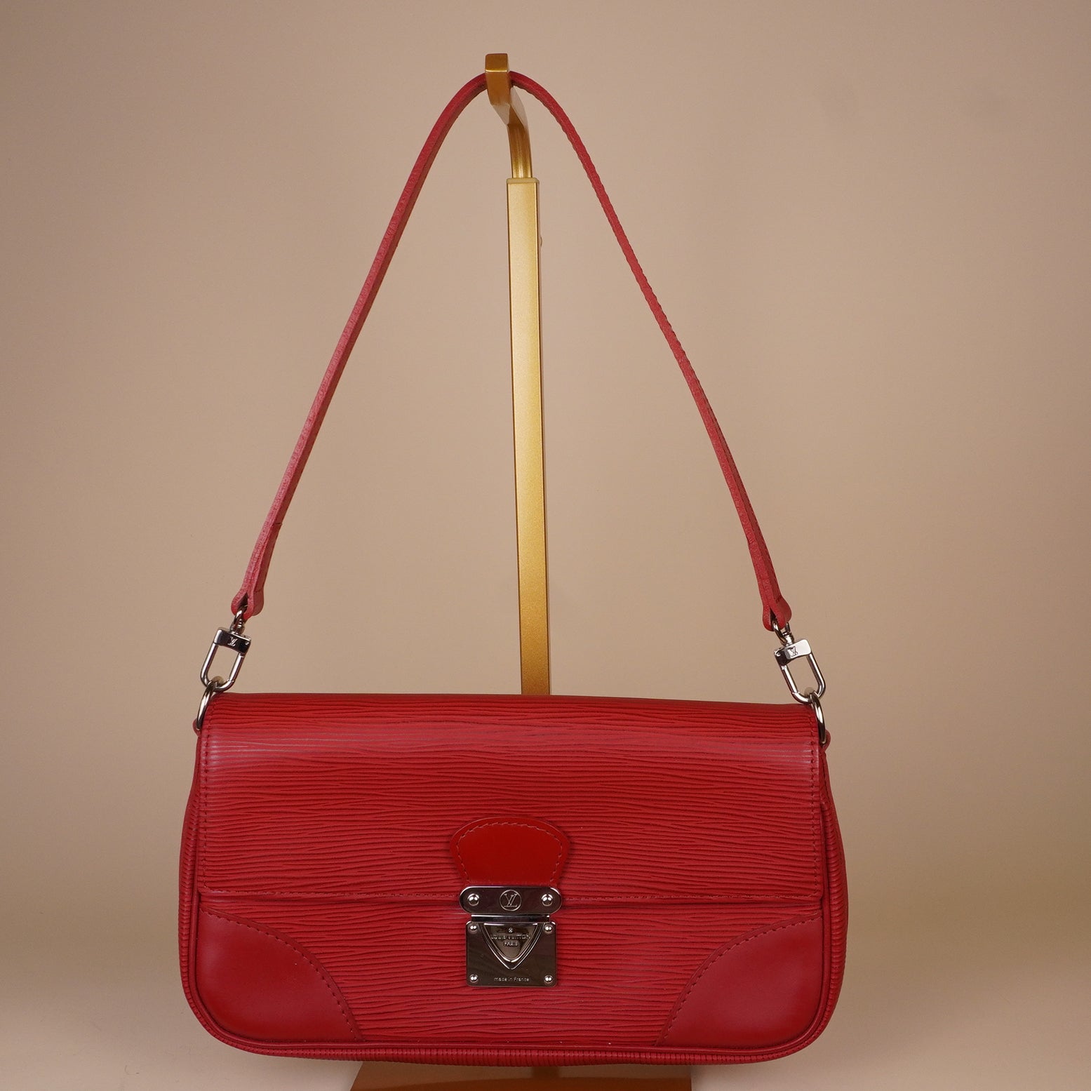 PRE-OWNED Rouge Epi Leather Pochette Segur Bag