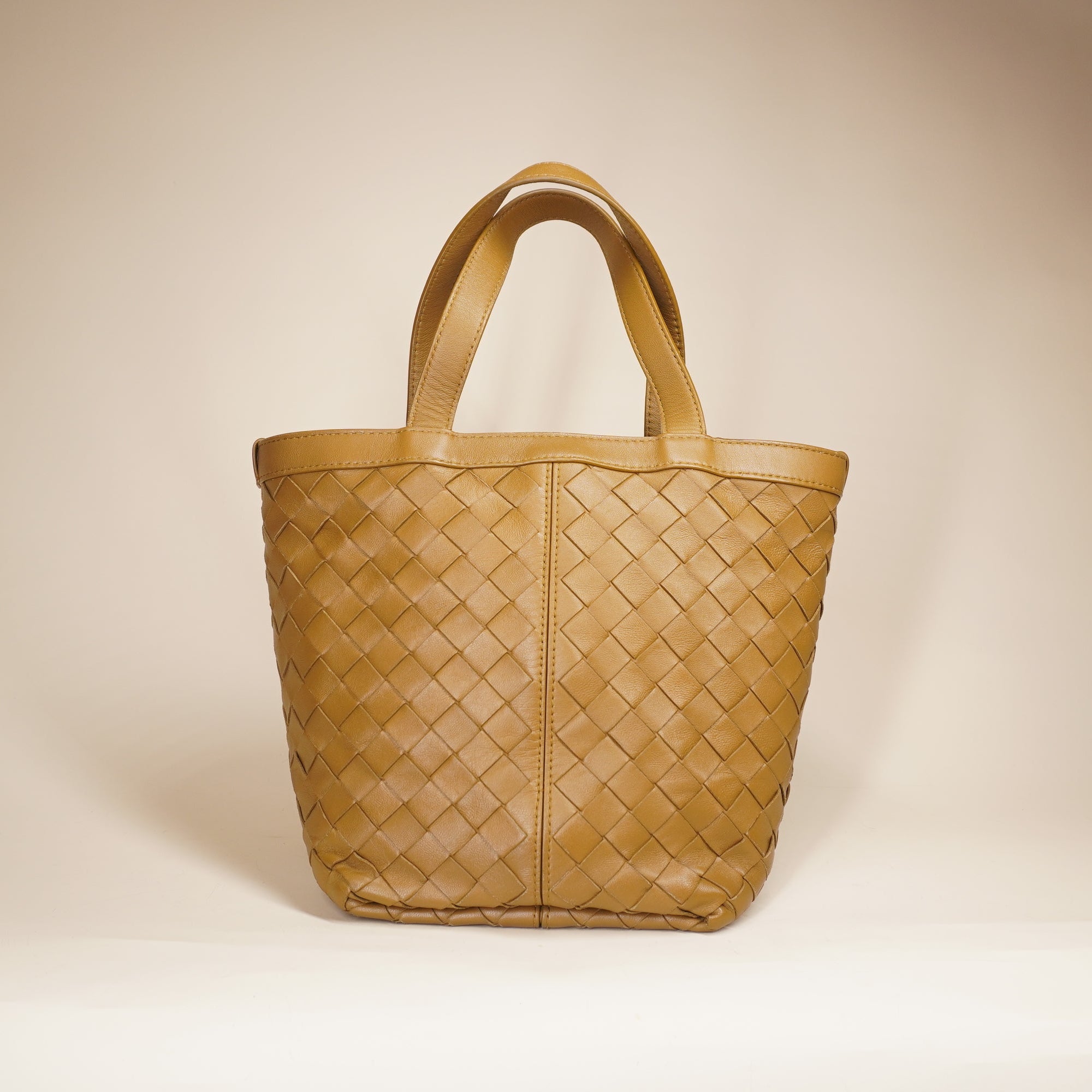 PRE-OWNED Small Flip Flap Tote in Intrecciato Leather Shoulder Bag