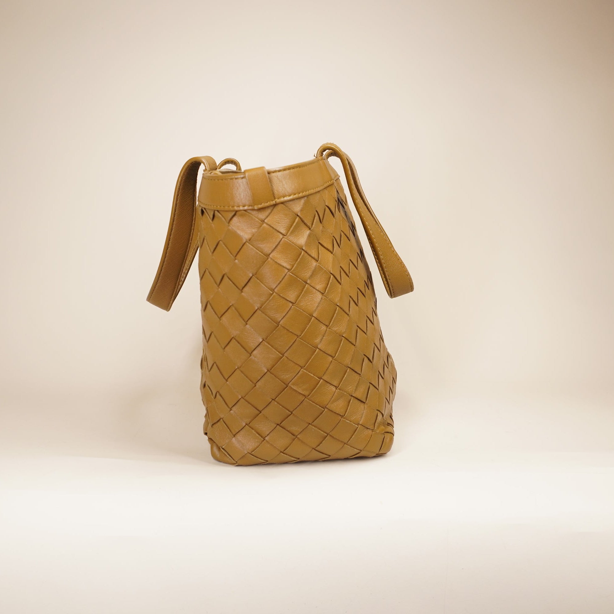 PRE-OWNED Small Flip Flap Tote in Intrecciato Leather Shoulder Bag