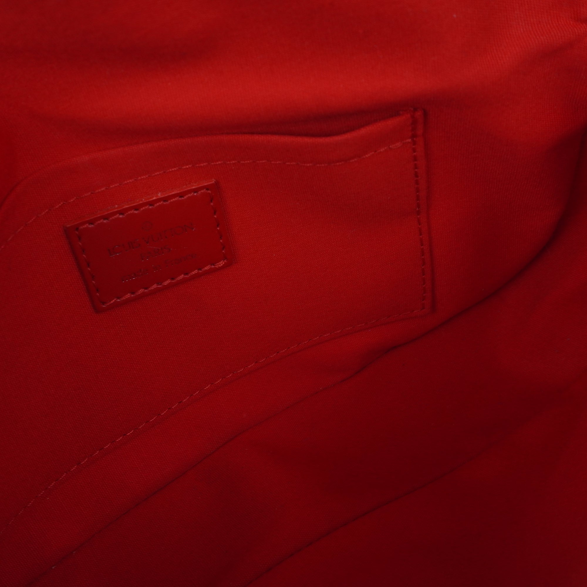 PRE-OWNED Rouge Epi Leather Pochette Segur Bag