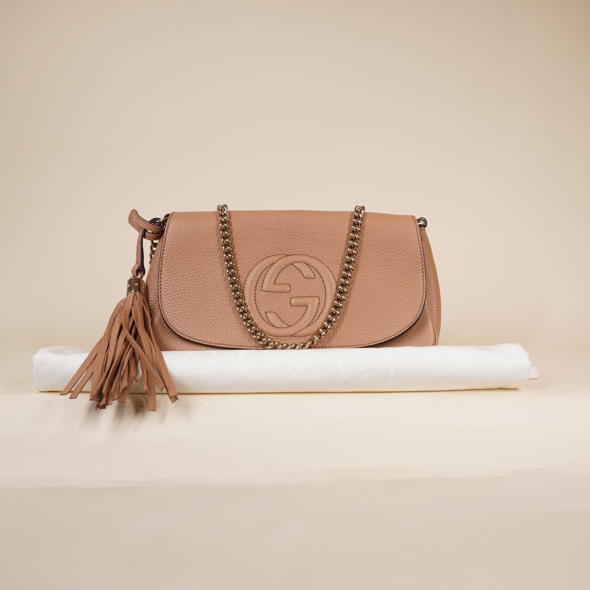 PRE-OWNED Pebbled Calfskin Medium Soho Flap Crossbody Camelia