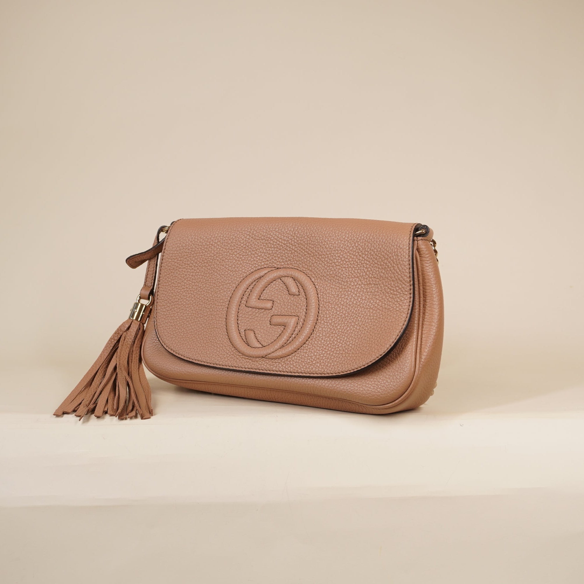 PRE-OWNED Pebbled Calfskin Medium Soho Flap Crossbody Camelia