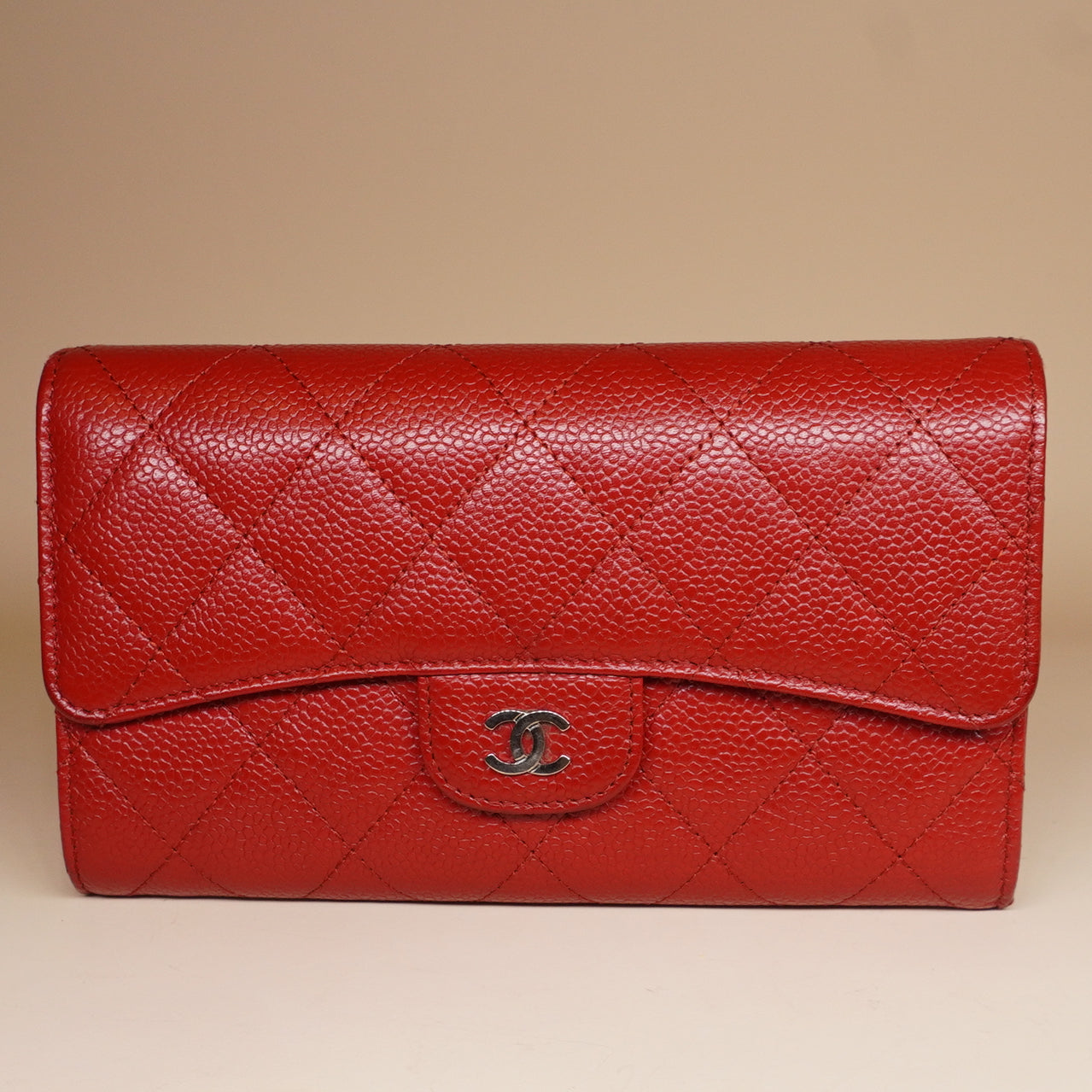 PRE-OWNED CC Red Quilted Caviar Leather Classic Flap Wallet