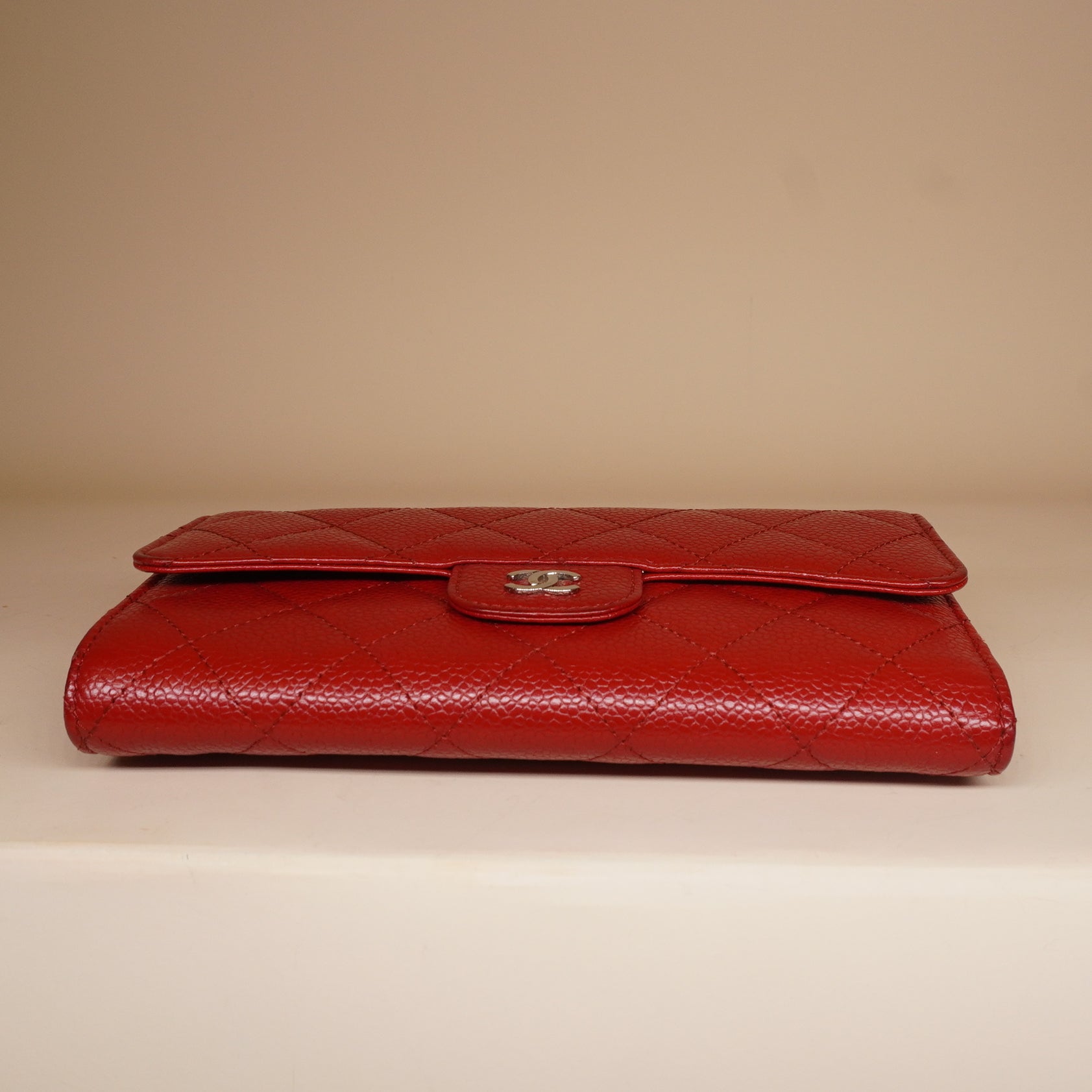 PRE-OWNED CC Red Quilted Caviar Leather Classic Flap Wallet