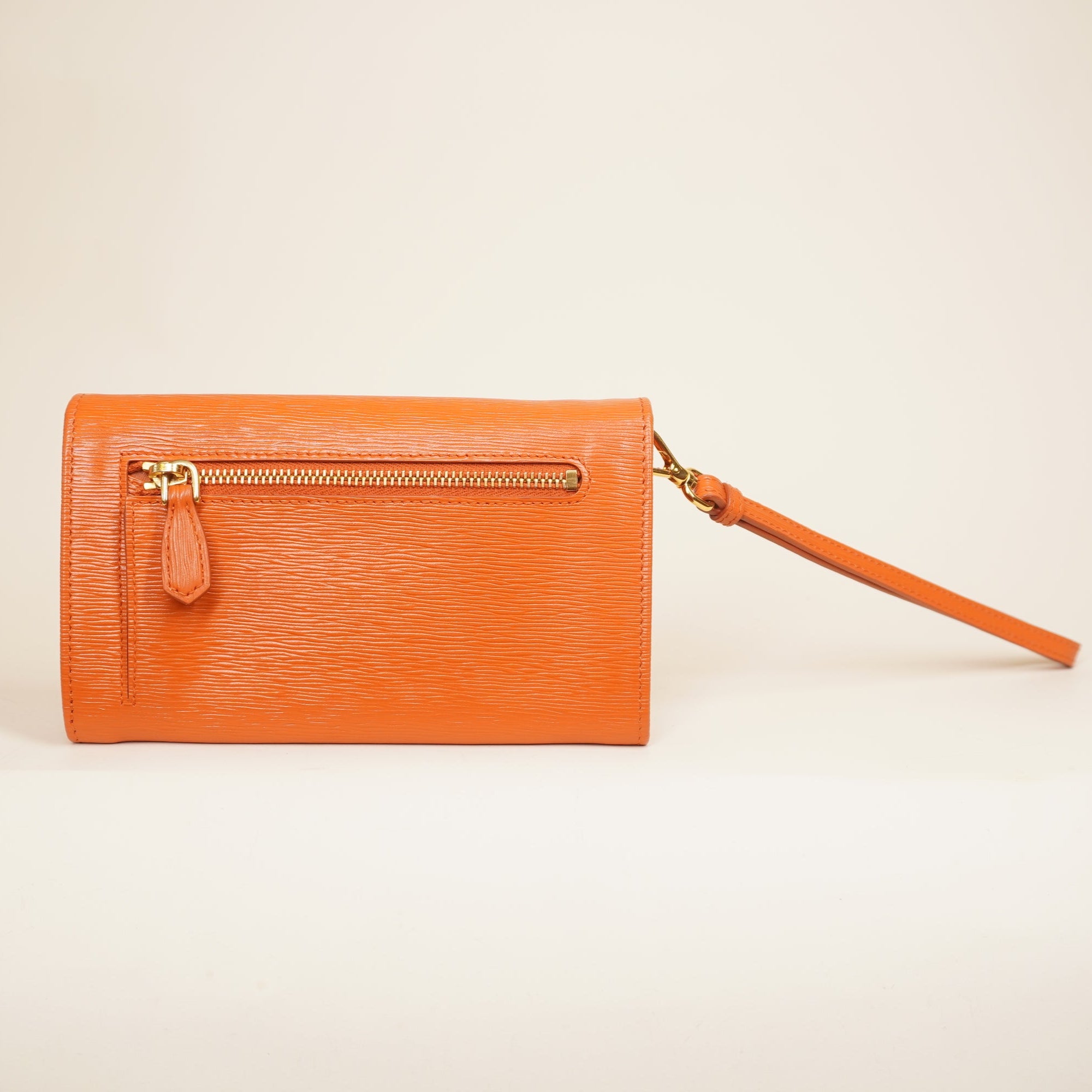 PRE-OWNED Saffiano Metal Wristlet Wallet Papaya