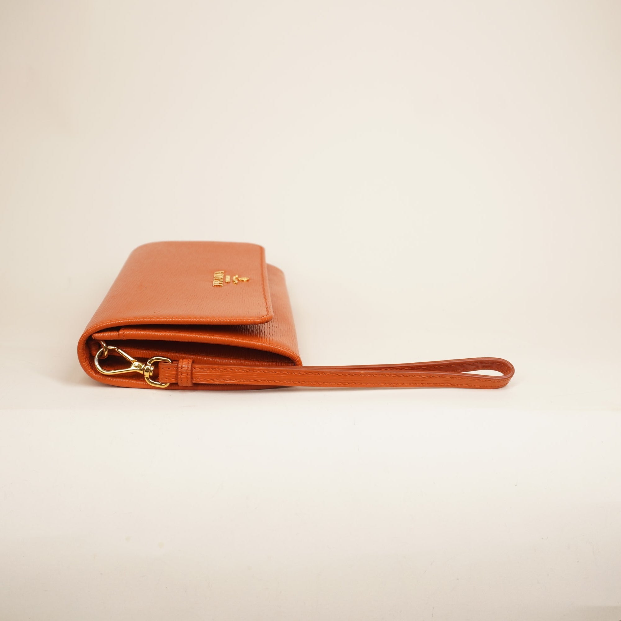 PRE-OWNED Saffiano Metal Wristlet Wallet Papaya