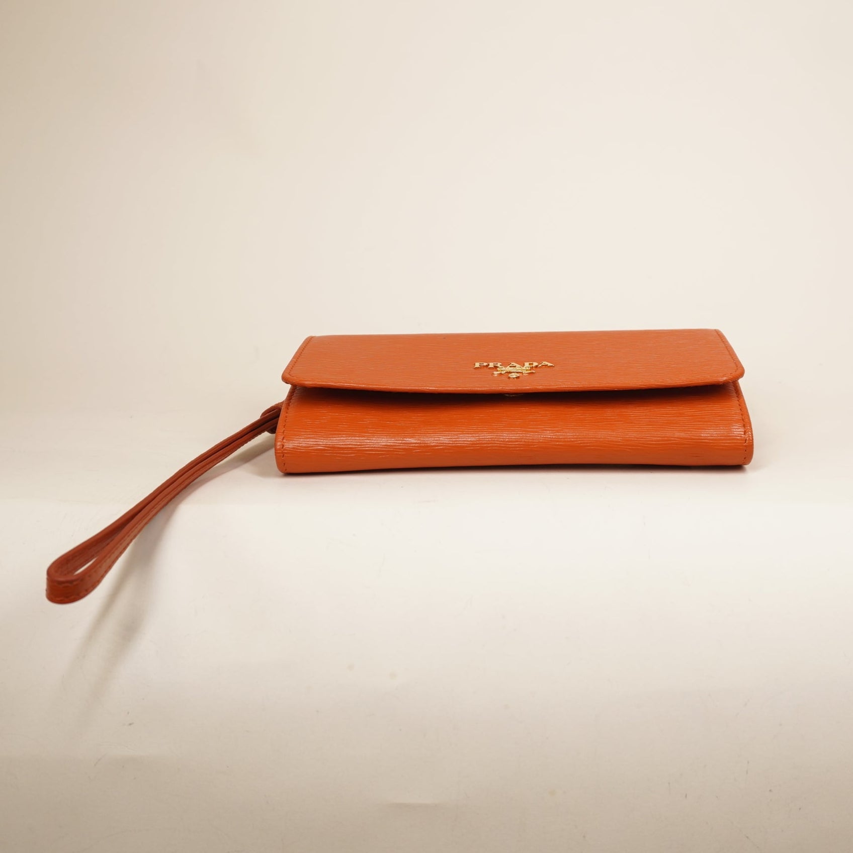 PRE-OWNED Saffiano Metal Wristlet Wallet Papaya