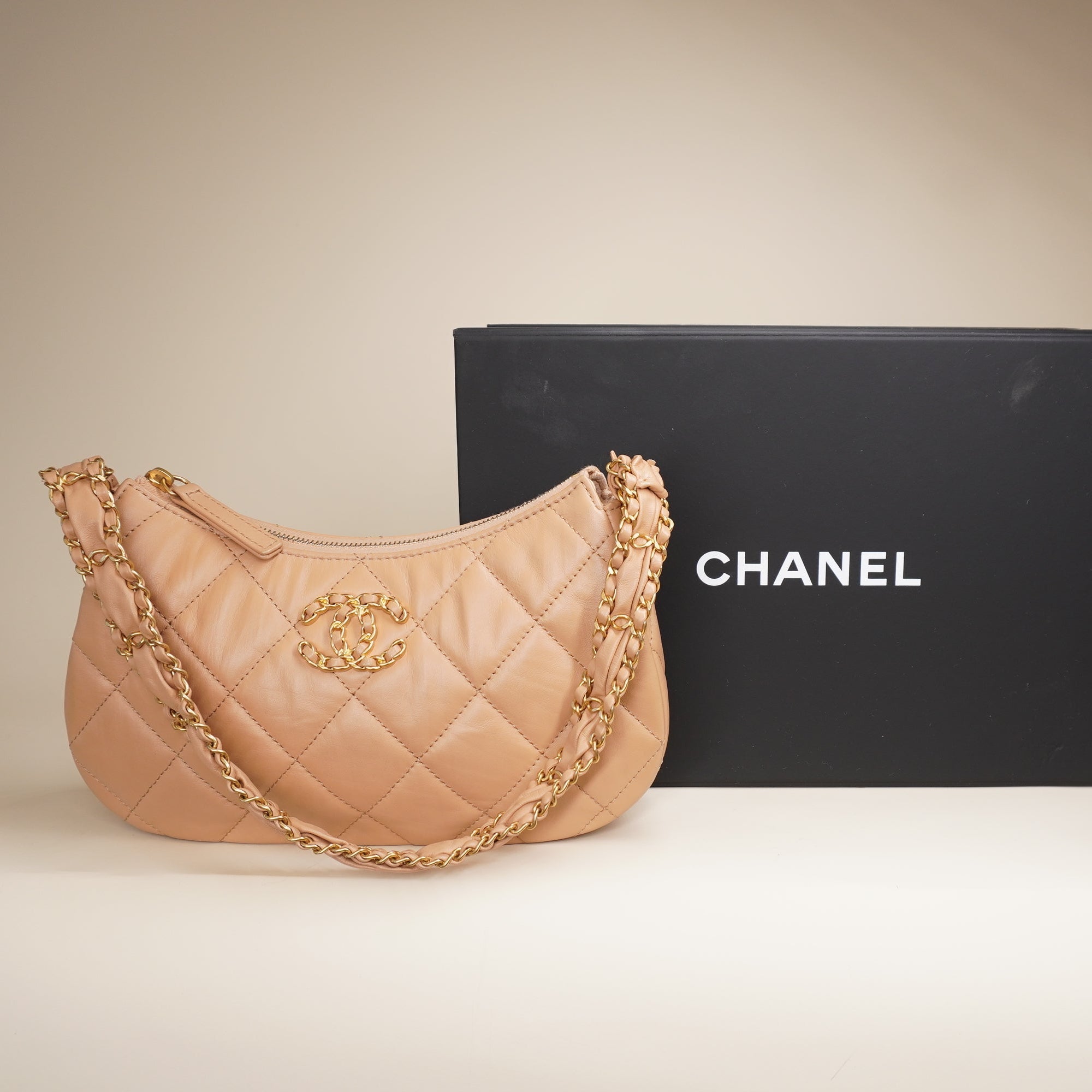 PRE-OWNED Aged Calfskin Quilted Small Chanel 19 Hobo Beige Shoulder Ba