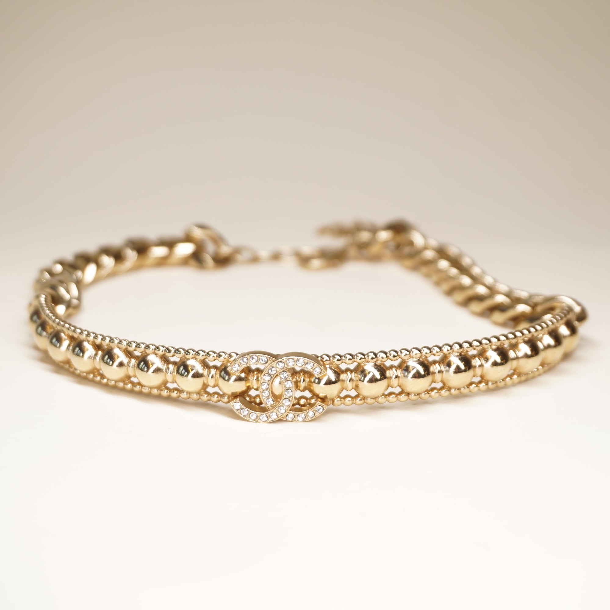 PRE-OWNED Coco Mark Rhinestone Strass Choker Golden