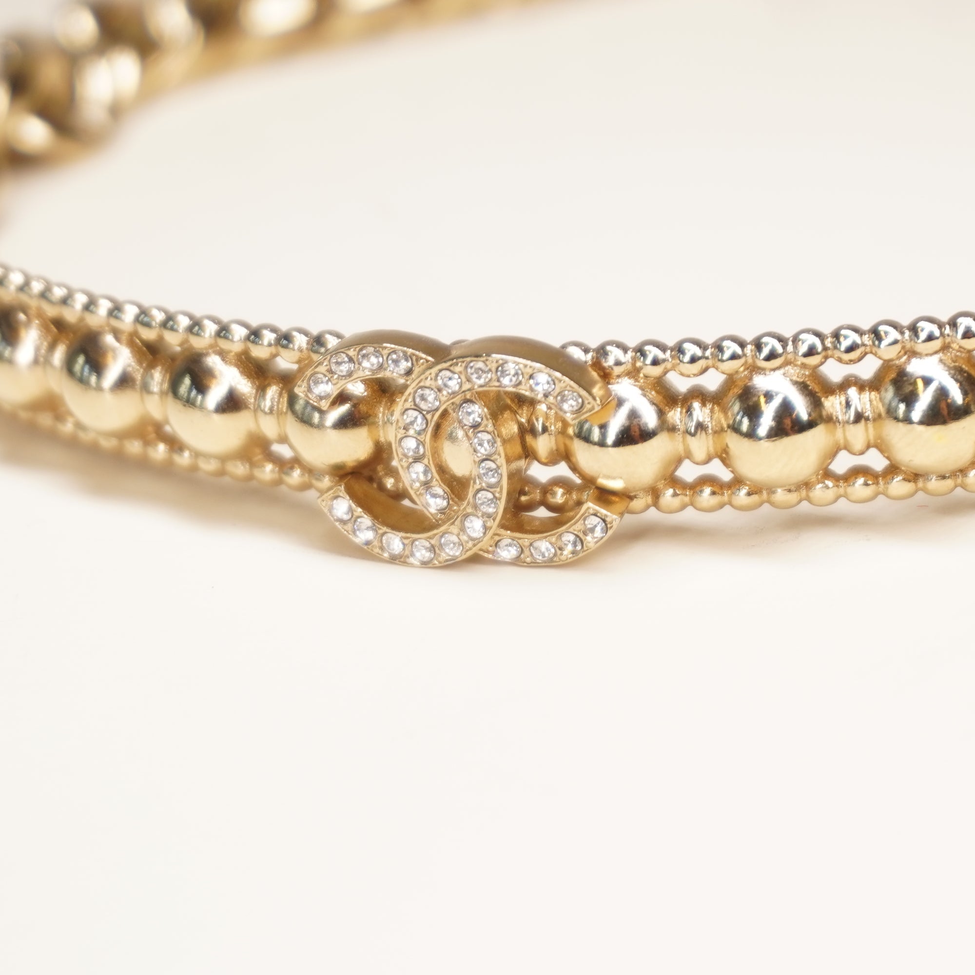 PRE-OWNED Coco Mark Rhinestone Strass Choker Golden