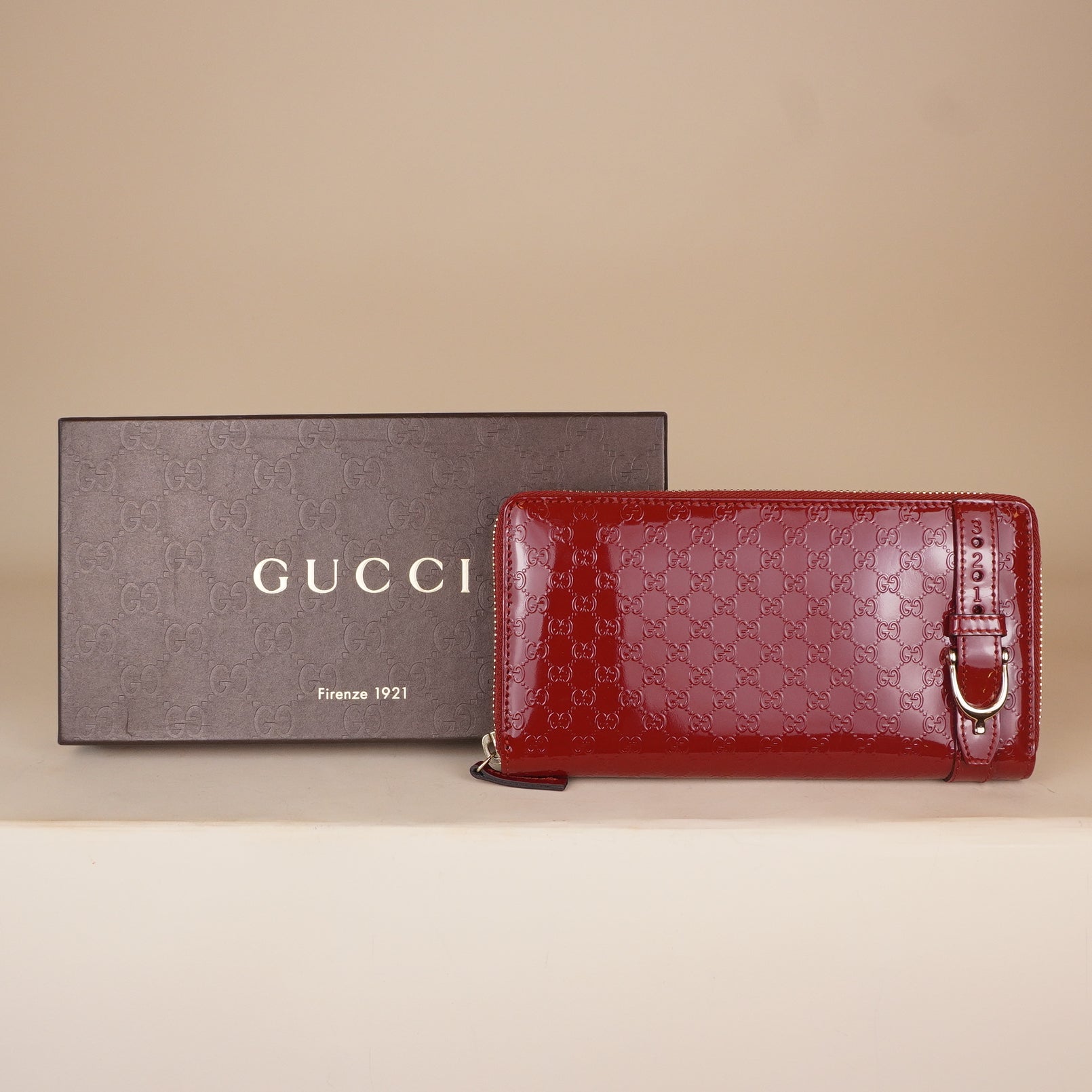 PRE-OWNED GG Microguccissima Patent Leather Stirrup Zip Around Wallet