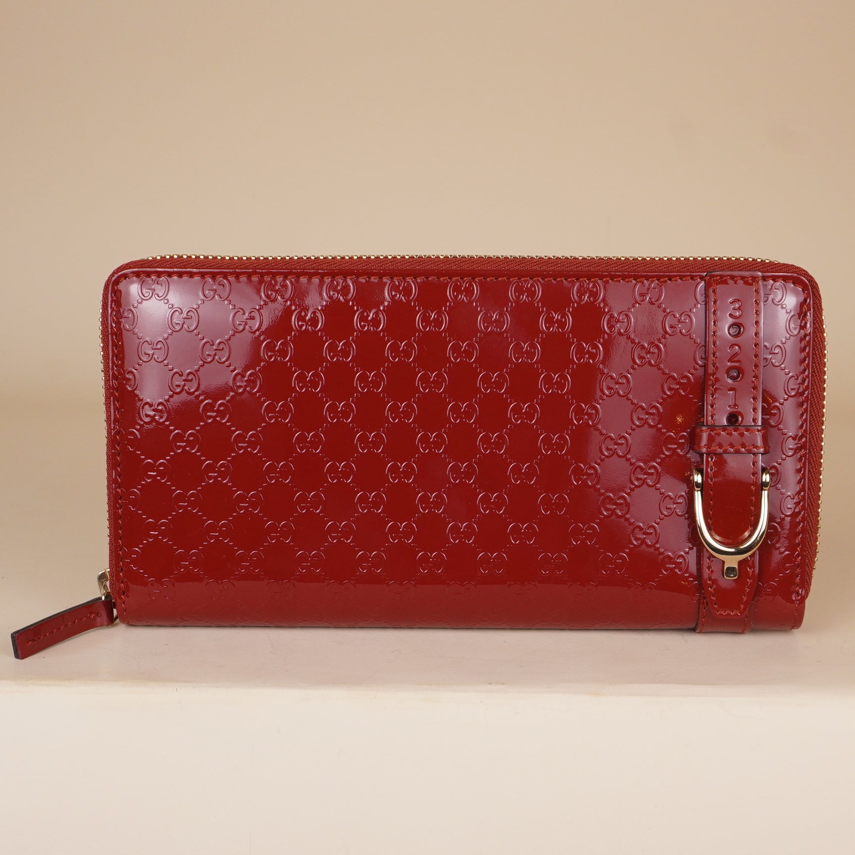 PRE-OWNED GG Microguccissima Patent Leather Stirrup Zip Around Wallet