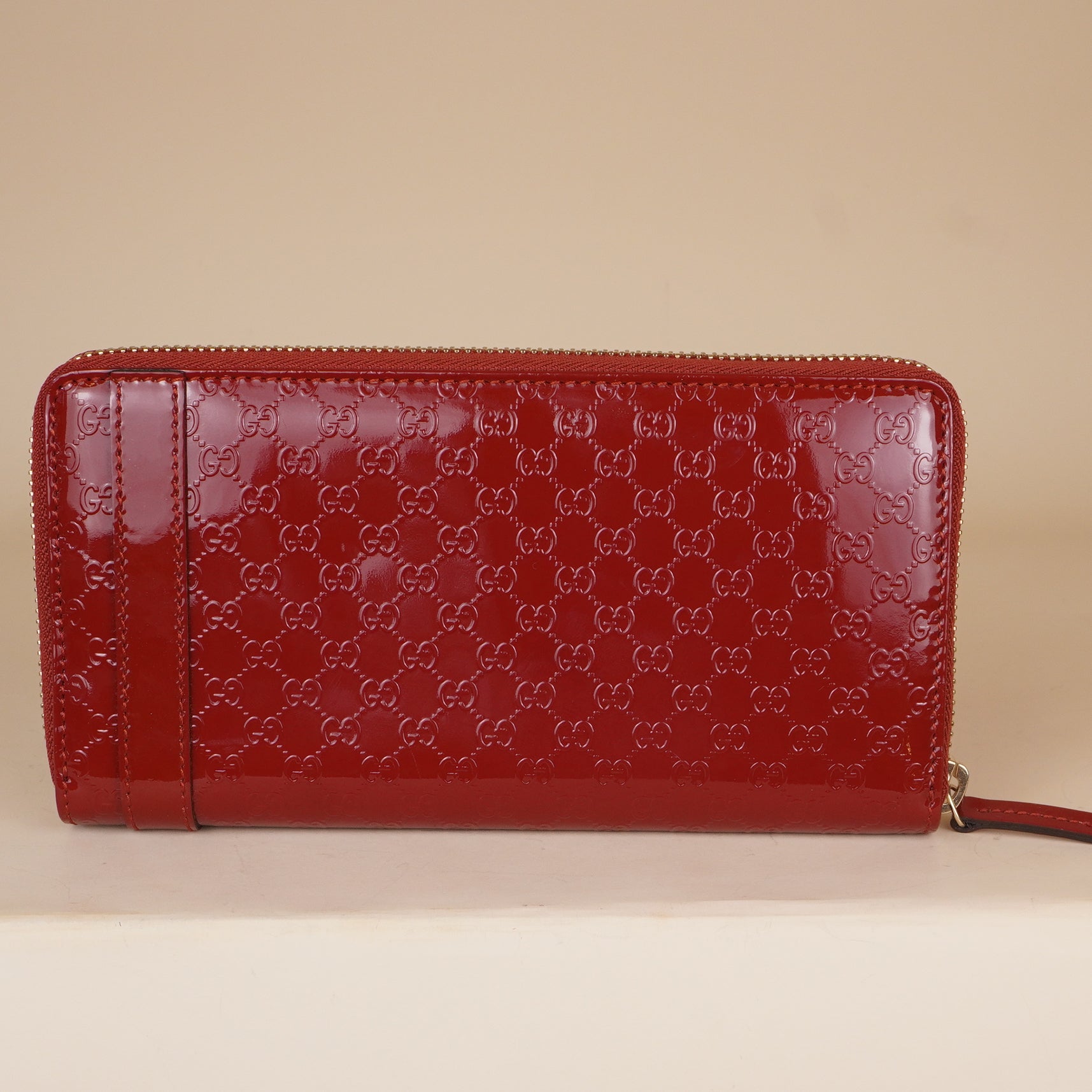 PRE-OWNED GG Microguccissima Patent Leather Stirrup Zip Around Wallet