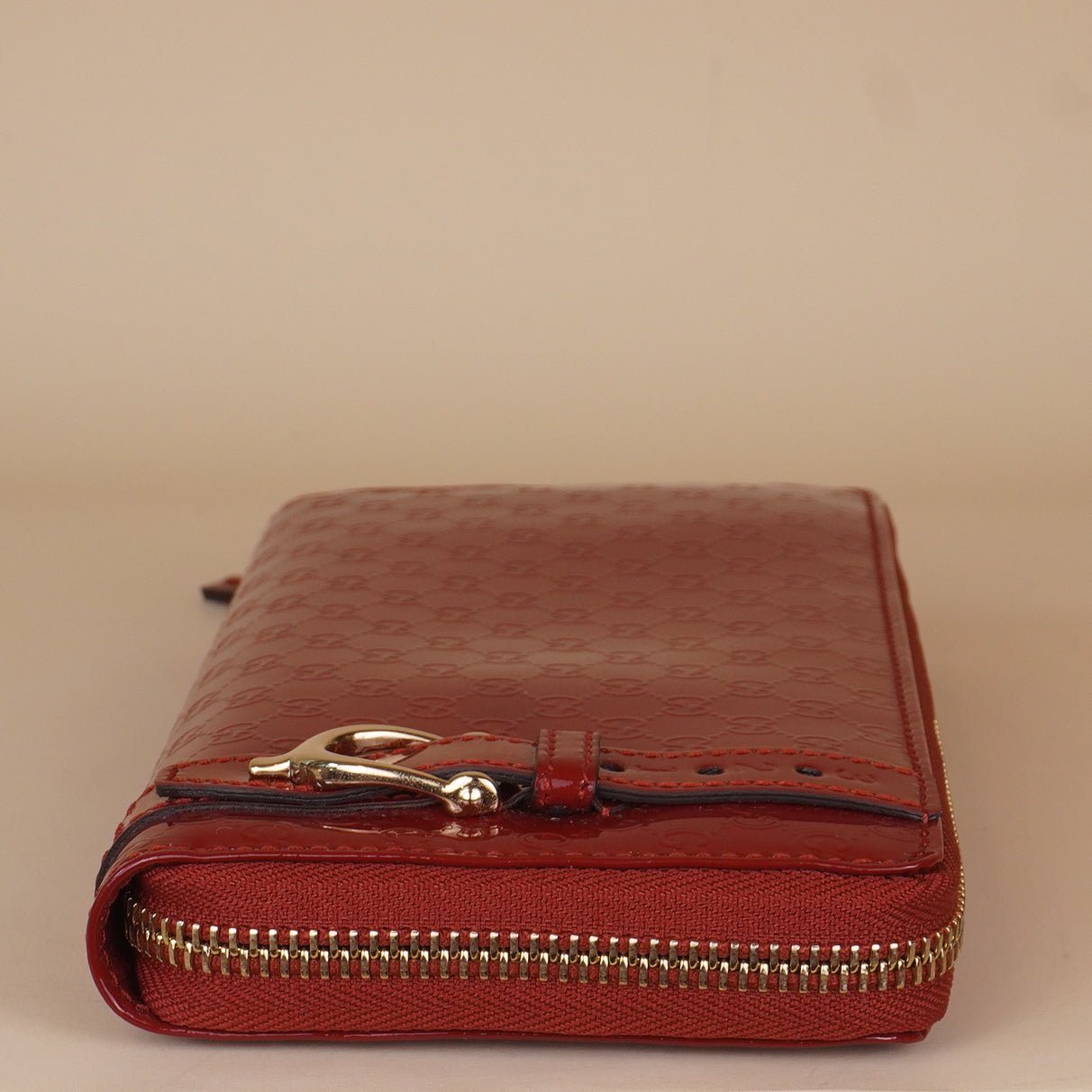 PRE-OWNED GG Microguccissima Patent Leather Stirrup Zip Around Wallet
